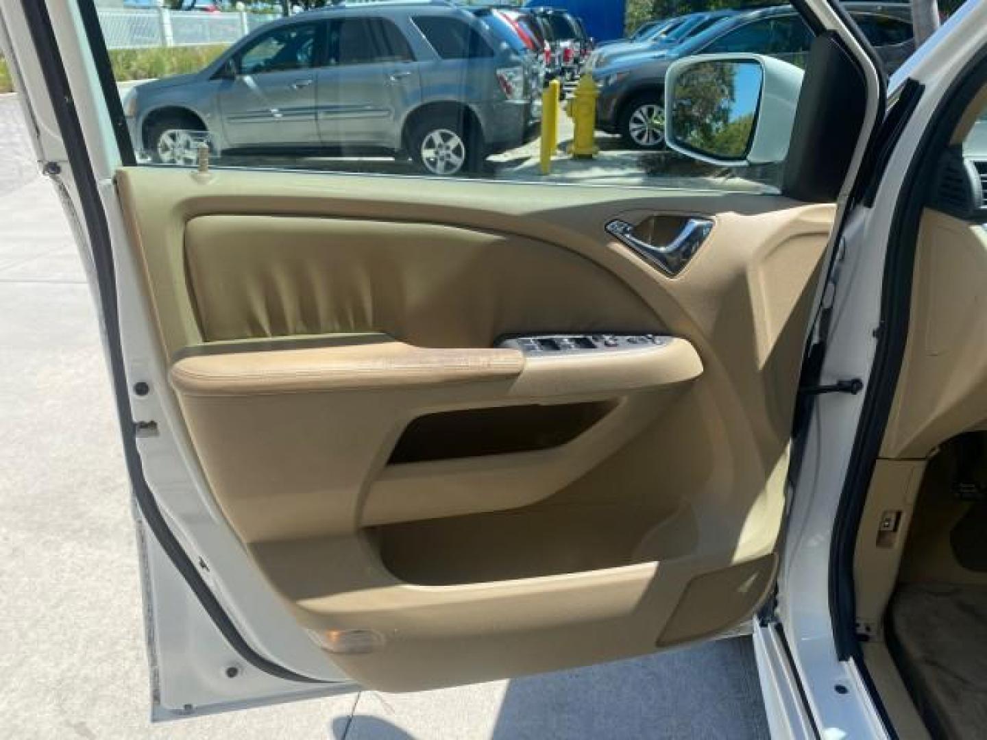 2010 Taffeta White /Ivory Honda Odyssey EX-L LOW MILES 58,506 1 OWNER BRAUN (5FNRL3H68AB) with an 3.5L SOHC MPFI 24-Valve i-VTEC V6 Engine engine, Automatic transmission, located at 4701 North Dixie Hwy, Pompano Beach, FL, 33064, (954) 422-2889, 26.240938, -80.123474 - OUR WEBPAGE FLORIDACARS1.COM HAS OVER 100 PHOTOS AND FREE CARFAX LINK 2010 HONDA ODYSSEY EX-L 1 OWNER BRAUN HANDICAP CONVERSION VAN NEW $33,544 VIN: 5FNRL3H68AB090445 5 F N R L 3 H 6 8 A B 0 9 0 4 4 5 VAN 3.5L V6 F SOHC 24V GASOLINE 25 MPG FRONT WHEEL DRIVE Features ABS Brakes Air Conditioning Alloy- Photo#41