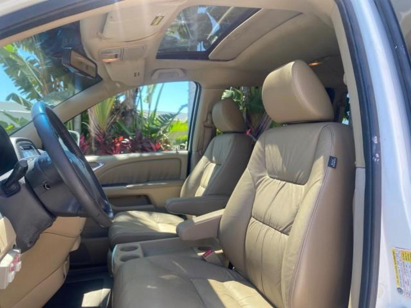 2010 Taffeta White /Ivory Honda Odyssey EX-L LOW MILES 58,506 1 OWNER BRAUN (5FNRL3H68AB) with an 3.5L SOHC MPFI 24-Valve i-VTEC V6 Engine engine, Automatic transmission, located at 4701 North Dixie Hwy, Pompano Beach, FL, 33064, (954) 422-2889, 26.240938, -80.123474 - OUR WEBPAGE FLORIDACARS1.COM HAS OVER 100 PHOTOS AND FREE CARFAX LINK 2010 HONDA ODYSSEY EX-L 1 OWNER BRAUN HANDICAP CONVERSION VAN NEW $33,544 VIN: 5FNRL3H68AB090445 5 F N R L 3 H 6 8 A B 0 9 0 4 4 5 VAN 3.5L V6 F SOHC 24V GASOLINE 25 MPG FRONT WHEEL DRIVE Features ABS Brakes Air Conditioning Alloy- Photo#42