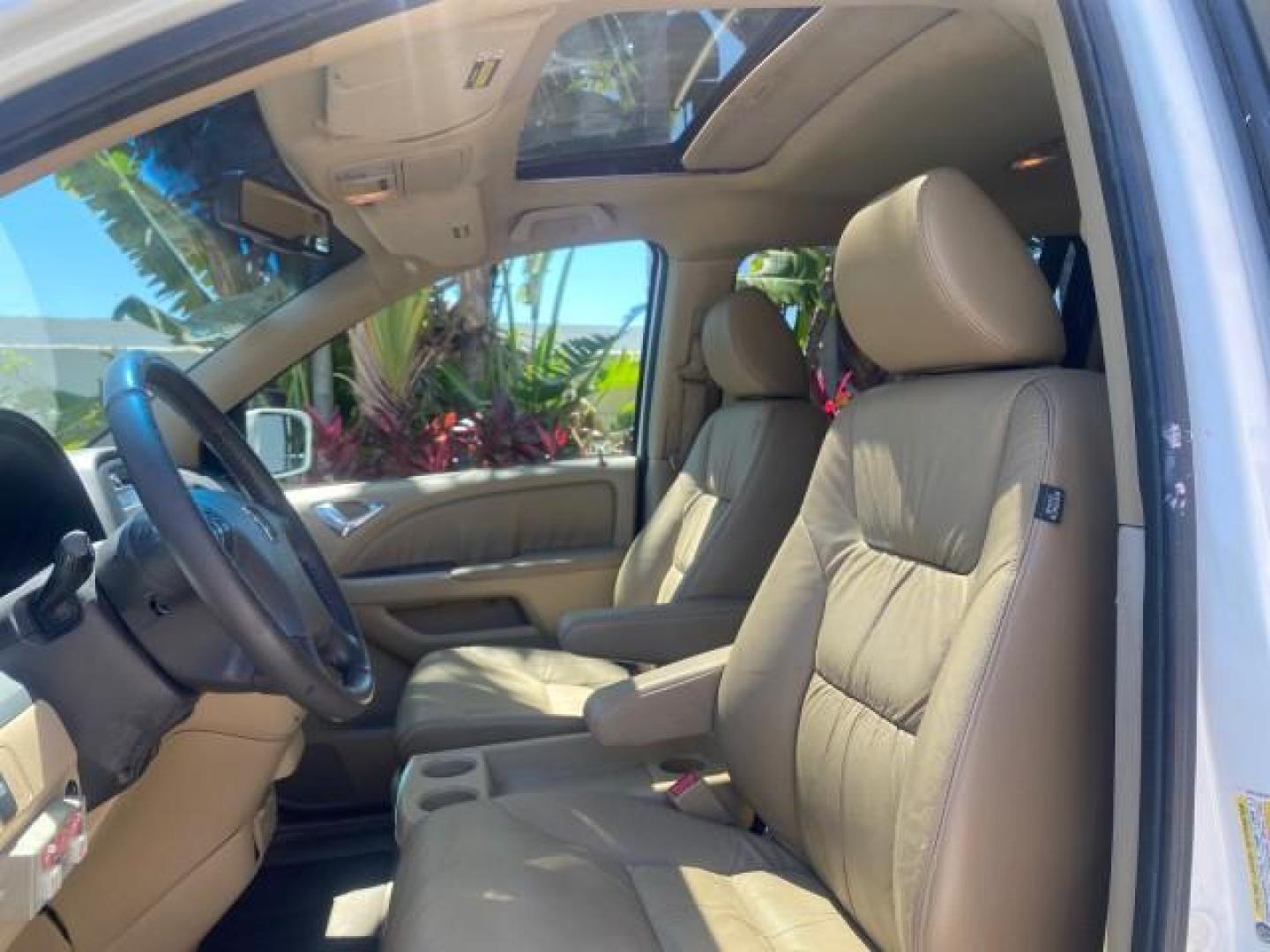2010 Taffeta White /Ivory Honda Odyssey EX-L LOW MILES 58,506 1 OWNER BRAUN (5FNRL3H68AB) with an 3.5L SOHC MPFI 24-Valve i-VTEC V6 Engine engine, Automatic transmission, located at 4701 North Dixie Hwy, Pompano Beach, FL, 33064, (954) 422-2889, 26.240938, -80.123474 - OUR WEBPAGE FLORIDACARS1.COM HAS OVER 100 PHOTOS AND FREE CARFAX LINK 2010 HONDA ODYSSEY EX-L 1 OWNER BRAUN HANDICAP CONVERSION VAN NEW $33,544 VIN: 5FNRL3H68AB090445 5 F N R L 3 H 6 8 A B 0 9 0 4 4 5 VAN 3.5L V6 F SOHC 24V GASOLINE 25 MPG FRONT WHEEL DRIVE Features ABS Brakes Air Conditioning Alloy- Photo#43