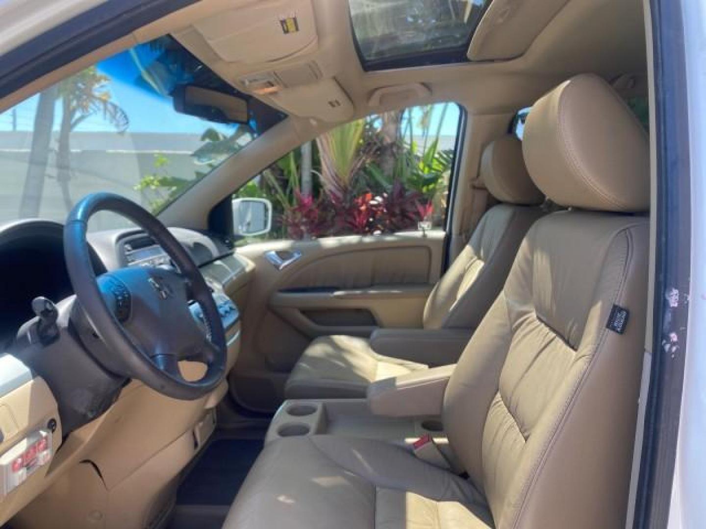 2010 Taffeta White /Ivory Honda Odyssey EX-L LOW MILES 58,506 1 OWNER BRAUN (5FNRL3H68AB) with an 3.5L SOHC MPFI 24-Valve i-VTEC V6 Engine engine, Automatic transmission, located at 4701 North Dixie Hwy, Pompano Beach, FL, 33064, (954) 422-2889, 26.240938, -80.123474 - OUR WEBPAGE FLORIDACARS1.COM HAS OVER 100 PHOTOS AND FREE CARFAX LINK 2010 HONDA ODYSSEY EX-L 1 OWNER BRAUN HANDICAP CONVERSION VAN NEW $33,544 VIN: 5FNRL3H68AB090445 5 F N R L 3 H 6 8 A B 0 9 0 4 4 5 VAN 3.5L V6 F SOHC 24V GASOLINE 25 MPG FRONT WHEEL DRIVE Features ABS Brakes Air Conditioning Alloy- Photo#44