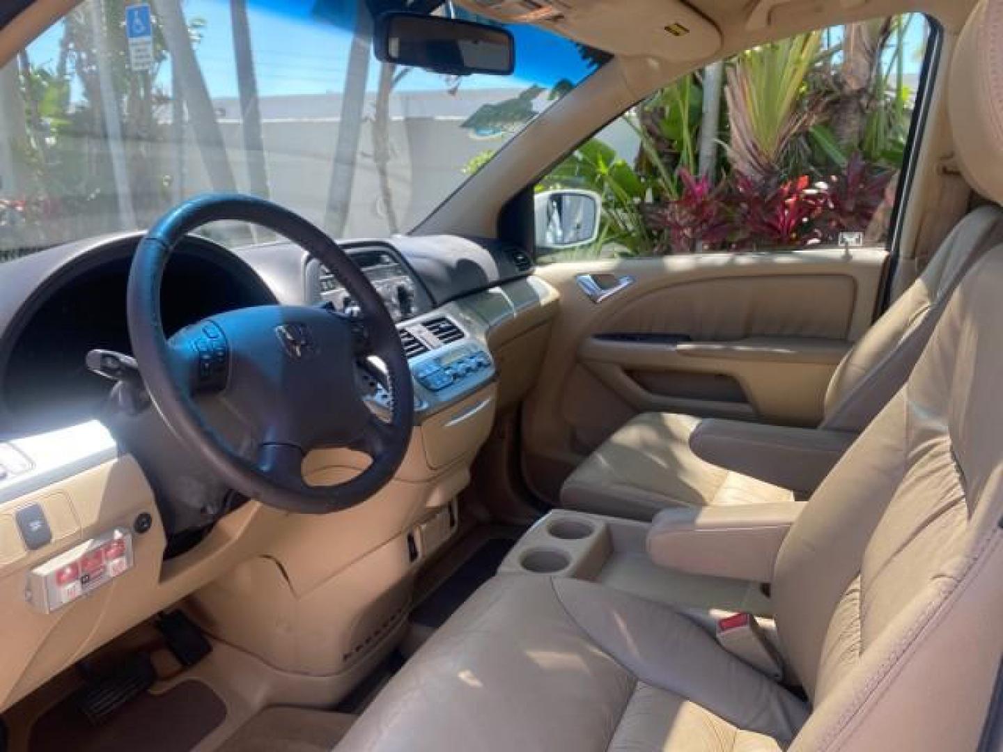 2010 Taffeta White /Ivory Honda Odyssey EX-L LOW MILES 58,506 1 OWNER BRAUN (5FNRL3H68AB) with an 3.5L SOHC MPFI 24-Valve i-VTEC V6 Engine engine, Automatic transmission, located at 4701 North Dixie Hwy, Pompano Beach, FL, 33064, (954) 422-2889, 26.240938, -80.123474 - OUR WEBPAGE FLORIDACARS1.COM HAS OVER 100 PHOTOS AND FREE CARFAX LINK 2010 HONDA ODYSSEY EX-L 1 OWNER BRAUN HANDICAP CONVERSION VAN NEW $33,544 VIN: 5FNRL3H68AB090445 5 F N R L 3 H 6 8 A B 0 9 0 4 4 5 VAN 3.5L V6 F SOHC 24V GASOLINE 25 MPG FRONT WHEEL DRIVE Features ABS Brakes Air Conditioning Alloy- Photo#45