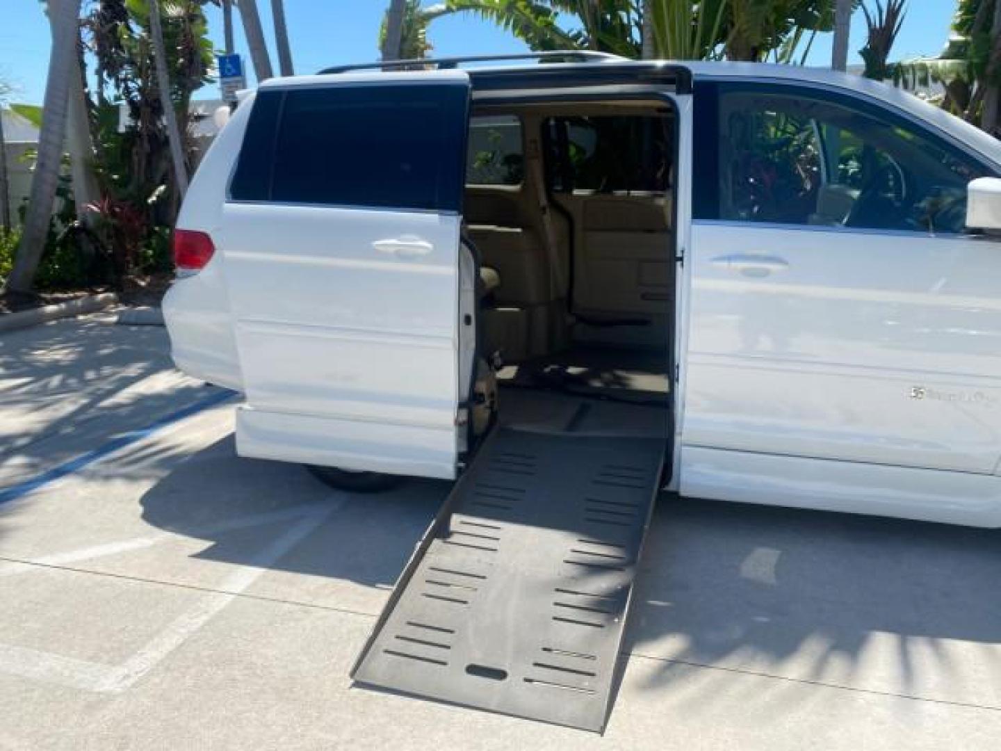 2010 Taffeta White /Ivory Honda Odyssey EX-L LOW MILES 58,506 1 OWNER BRAUN (5FNRL3H68AB) with an 3.5L SOHC MPFI 24-Valve i-VTEC V6 Engine engine, Automatic transmission, located at 4701 North Dixie Hwy, Pompano Beach, FL, 33064, (954) 422-2889, 26.240938, -80.123474 - OUR WEBPAGE FLORIDACARS1.COM HAS OVER 100 PHOTOS AND FREE CARFAX LINK 2010 HONDA ODYSSEY EX-L 1 OWNER BRAUN HANDICAP CONVERSION VAN NEW $33,544 VIN: 5FNRL3H68AB090445 5 F N R L 3 H 6 8 A B 0 9 0 4 4 5 VAN 3.5L V6 F SOHC 24V GASOLINE 25 MPG FRONT WHEEL DRIVE Features ABS Brakes Air Conditioning Alloy- Photo#46