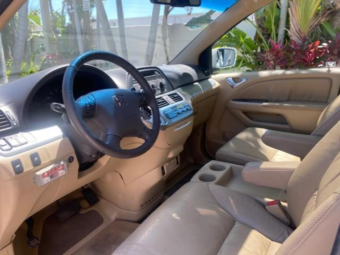 2010 Taffeta White /Ivory Honda Odyssey EX-L LOW MILES 58,506 1 OWNER BRAUN (5FNRL3H68AB) with an 3.5L SOHC MPFI 24-Valve i-VTEC V6 Engine engine, Automatic transmission, located at 4701 North Dixie Hwy, Pompano Beach, FL, 33064, (954) 422-2889, 26.240938, -80.123474 - OUR WEBPAGE FLORIDACARS1.COM HAS OVER 100 PHOTOS AND FREE CARFAX LINK 2010 HONDA ODYSSEY EX-L 1 OWNER BRAUN HANDICAP CONVERSION VAN NEW $33,544 VIN: 5FNRL3H68AB090445 5 F N R L 3 H 6 8 A B 0 9 0 4 4 5 VAN 3.5L V6 F SOHC 24V GASOLINE 25 MPG FRONT WHEEL DRIVE Features ABS Brakes Air Conditioning Alloy- Photo#47