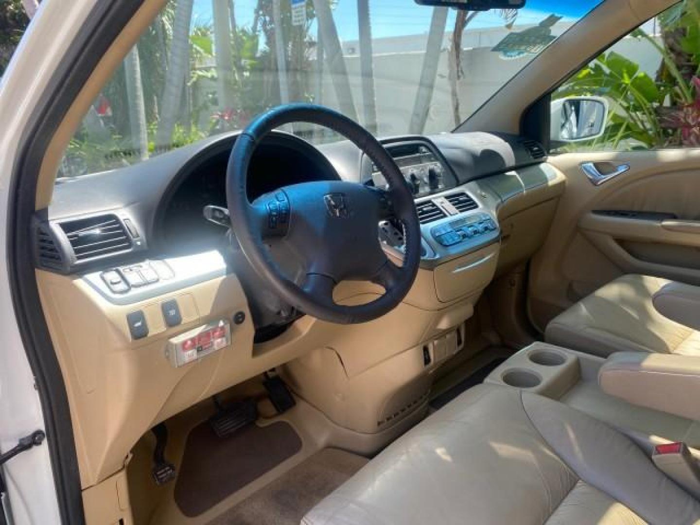 2010 Taffeta White /Ivory Honda Odyssey EX-L LOW MILES 58,506 1 OWNER BRAUN (5FNRL3H68AB) with an 3.5L SOHC MPFI 24-Valve i-VTEC V6 Engine engine, Automatic transmission, located at 4701 North Dixie Hwy, Pompano Beach, FL, 33064, (954) 422-2889, 26.240938, -80.123474 - OUR WEBPAGE FLORIDACARS1.COM HAS OVER 100 PHOTOS AND FREE CARFAX LINK 2010 HONDA ODYSSEY EX-L 1 OWNER BRAUN HANDICAP CONVERSION VAN NEW $33,544 VIN: 5FNRL3H68AB090445 5 F N R L 3 H 6 8 A B 0 9 0 4 4 5 VAN 3.5L V6 F SOHC 24V GASOLINE 25 MPG FRONT WHEEL DRIVE Features ABS Brakes Air Conditioning Alloy- Photo#48