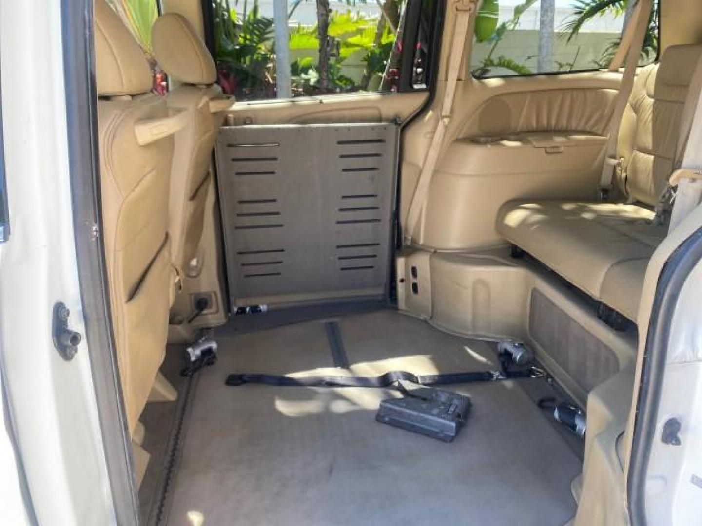 2010 Taffeta White /Ivory Honda Odyssey EX-L LOW MILES 58,506 1 OWNER BRAUN (5FNRL3H68AB) with an 3.5L SOHC MPFI 24-Valve i-VTEC V6 Engine engine, Automatic transmission, located at 4701 North Dixie Hwy, Pompano Beach, FL, 33064, (954) 422-2889, 26.240938, -80.123474 - OUR WEBPAGE FLORIDACARS1.COM HAS OVER 100 PHOTOS AND FREE CARFAX LINK 2010 HONDA ODYSSEY EX-L 1 OWNER BRAUN HANDICAP CONVERSION VAN NEW $33,544 VIN: 5FNRL3H68AB090445 5 F N R L 3 H 6 8 A B 0 9 0 4 4 5 VAN 3.5L V6 F SOHC 24V GASOLINE 25 MPG FRONT WHEEL DRIVE Features ABS Brakes Air Conditioning Alloy- Photo#79