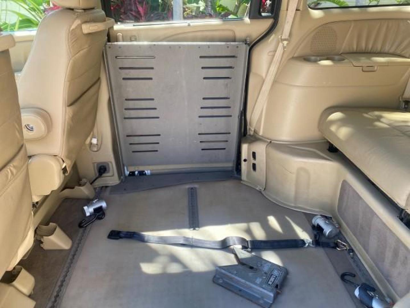2010 Taffeta White /Ivory Honda Odyssey EX-L LOW MILES 58,506 1 OWNER BRAUN (5FNRL3H68AB) with an 3.5L SOHC MPFI 24-Valve i-VTEC V6 Engine engine, Automatic transmission, located at 4701 North Dixie Hwy, Pompano Beach, FL, 33064, (954) 422-2889, 26.240938, -80.123474 - OUR WEBPAGE FLORIDACARS1.COM HAS OVER 100 PHOTOS AND FREE CARFAX LINK 2010 HONDA ODYSSEY EX-L 1 OWNER BRAUN HANDICAP CONVERSION VAN NEW $33,544 VIN: 5FNRL3H68AB090445 5 F N R L 3 H 6 8 A B 0 9 0 4 4 5 VAN 3.5L V6 F SOHC 24V GASOLINE 25 MPG FRONT WHEEL DRIVE Features ABS Brakes Air Conditioning Alloy- Photo#89