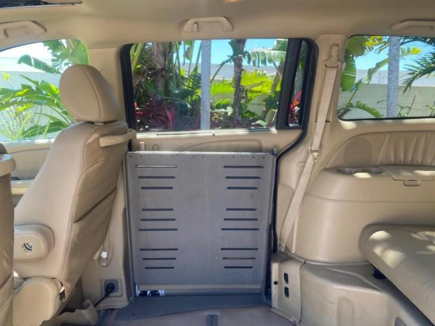 2010 Taffeta White /Ivory Honda Odyssey EX-L LOW MILES 58,506 1 OWNER BRAUN (5FNRL3H68AB) with an 3.5L SOHC MPFI 24-Valve i-VTEC V6 Engine engine, Automatic transmission, located at 4701 North Dixie Hwy, Pompano Beach, FL, 33064, (954) 422-2889, 26.240938, -80.123474 - OUR WEBPAGE FLORIDACARS1.COM HAS OVER 100 PHOTOS AND FREE CARFAX LINK 2010 HONDA ODYSSEY EX-L 1 OWNER BRAUN HANDICAP CONVERSION VAN NEW $33,544 VIN: 5FNRL3H68AB090445 5 F N R L 3 H 6 8 A B 0 9 0 4 4 5 VAN 3.5L V6 F SOHC 24V GASOLINE 25 MPG FRONT WHEEL DRIVE Features ABS Brakes Air Conditioning Alloy- Photo#90