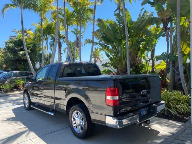 2006 Black /Tan Ford F-150 XLT LOW MILES 61,649 (1FTPX12596N) with an 5.4L 3v EFI V8 Engine engine, Automatic transmission, located at 4701 North Dixie Hwy, Pompano Beach, FL, 33064, (954) 422-2889, 26.240938, -80.123474 - OUR WEBPAGE FLORIDACARS1.COM HAS OVER 100 PHOTOS AND FREE CARFAX LINK 2006 FORD F-150 XLT 6.5 FT BED LOADED VERY HANDY FOR WORK VIN: 1FTPX12596NA02804 1 F T P X 1 2 5 9 6 N A 0 2 8 0 4 4 DOOR EXTENDED CAB PICKUP 5.4L V8 F SOHC GASOLINE 19 MPG REAR WHEEL DRIVE Features ABS Brakes Air Conditioning All - Photo#5