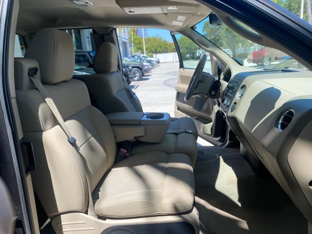 2006 Black /Tan Ford F-150 XLT LOW MILES 61,649 (1FTPX12596N) with an 5.4L 3v EFI V8 Engine engine, Automatic transmission, located at 4701 North Dixie Hwy, Pompano Beach, FL, 33064, (954) 422-2889, 26.240938, -80.123474 - OUR WEBPAGE FLORIDACARS1.COM HAS OVER 100 PHOTOS AND FREE CARFAX LINK 2006 FORD F-150 XLT 6.5 FT BED LOADED VERY HANDY FOR WORK VIN: 1FTPX12596NA02804 1 F T P X 1 2 5 9 6 N A 0 2 8 0 4 4 DOOR EXTENDED CAB PICKUP 5.4L V8 F SOHC GASOLINE 19 MPG REAR WHEEL DRIVE Features ABS Brakes Air Conditioning All - Photo#12