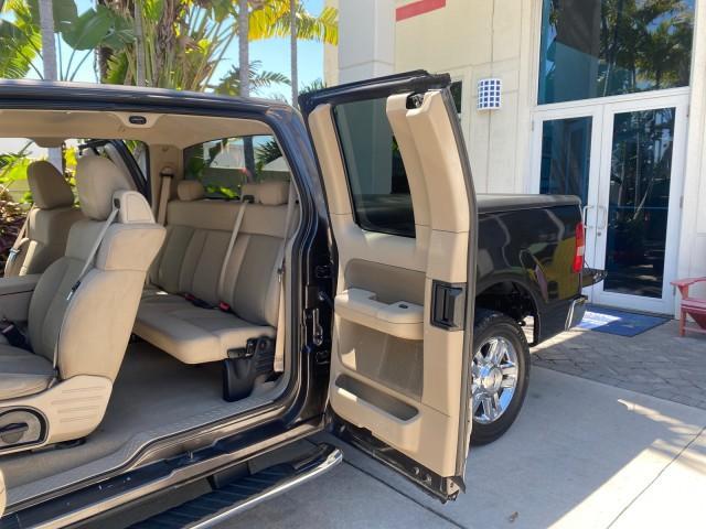 2006 Black /Tan Ford F-150 XLT LOW MILES 61,649 (1FTPX12596N) with an 5.4L 3v EFI V8 Engine engine, Automatic transmission, located at 4701 North Dixie Hwy, Pompano Beach, FL, 33064, (954) 422-2889, 26.240938, -80.123474 - OUR WEBPAGE FLORIDACARS1.COM HAS OVER 100 PHOTOS AND FREE CARFAX LINK 2006 FORD F-150 XLT 6.5 FT BED LOADED VERY HANDY FOR WORK VIN: 1FTPX12596NA02804 1 F T P X 1 2 5 9 6 N A 0 2 8 0 4 4 DOOR EXTENDED CAB PICKUP 5.4L V8 F SOHC GASOLINE 19 MPG REAR WHEEL DRIVE Features ABS Brakes Air Conditioning All - Photo#13