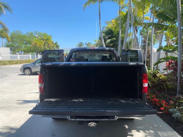 2006 Black /Tan Ford F-150 XLT LOW MILES 61,649 (1FTPX12596N) with an 5.4L 3v EFI V8 Engine engine, Automatic transmission, located at 4701 North Dixie Hwy, Pompano Beach, FL, 33064, (954) 422-2889, 26.240938, -80.123474 - OUR WEBPAGE FLORIDACARS1.COM HAS OVER 100 PHOTOS AND FREE CARFAX LINK 2006 FORD F-150 XLT 6.5 FT BED LOADED VERY HANDY FOR WORK VIN: 1FTPX12596NA02804 1 F T P X 1 2 5 9 6 N A 0 2 8 0 4 4 DOOR EXTENDED CAB PICKUP 5.4L V8 F SOHC GASOLINE 19 MPG REAR WHEEL DRIVE Features ABS Brakes Air Conditioning All - Photo#15
