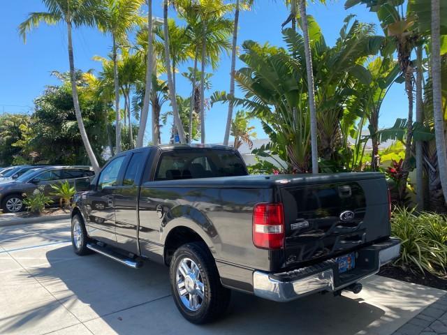 2006 Black /Tan Ford F-150 XLT LOW MILES 61,649 (1FTPX12596N) with an 5.4L 3v EFI V8 Engine engine, Automatic transmission, located at 4701 North Dixie Hwy, Pompano Beach, FL, 33064, (954) 422-2889, 26.240938, -80.123474 - OUR WEBPAGE FLORIDACARS1.COM HAS OVER 100 PHOTOS AND FREE CARFAX LINK 2006 FORD F-150 XLT 6.5 FT BED LOADED VERY HANDY FOR WORK VIN: 1FTPX12596NA02804 1 F T P X 1 2 5 9 6 N A 0 2 8 0 4 4 DOOR EXTENDED CAB PICKUP 5.4L V8 F SOHC GASOLINE 19 MPG REAR WHEEL DRIVE Features ABS Brakes Air Conditioning All - Photo#32