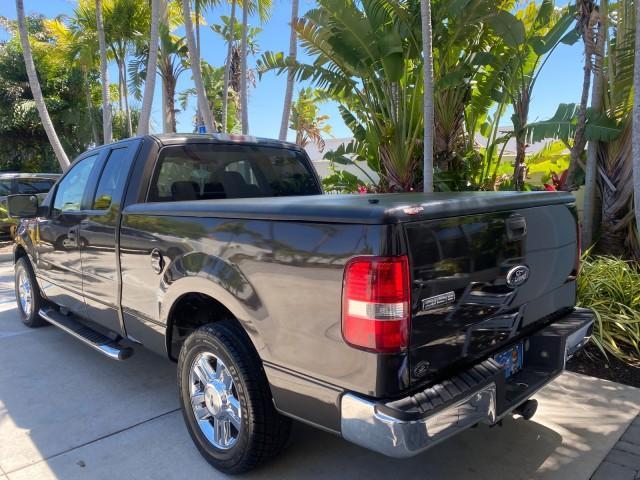 2006 Black /Tan Ford F-150 XLT LOW MILES 61,649 (1FTPX12596N) with an 5.4L 3v EFI V8 Engine engine, Automatic transmission, located at 4701 North Dixie Hwy, Pompano Beach, FL, 33064, (954) 422-2889, 26.240938, -80.123474 - OUR WEBPAGE FLORIDACARS1.COM HAS OVER 100 PHOTOS AND FREE CARFAX LINK 2006 FORD F-150 XLT 6.5 FT BED LOADED VERY HANDY FOR WORK VIN: 1FTPX12596NA02804 1 F T P X 1 2 5 9 6 N A 0 2 8 0 4 4 DOOR EXTENDED CAB PICKUP 5.4L V8 F SOHC GASOLINE 19 MPG REAR WHEEL DRIVE Features ABS Brakes Air Conditioning All - Photo#33