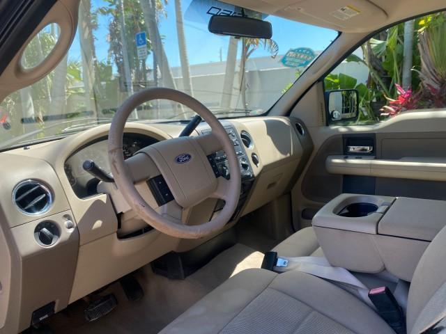 2006 Black /Tan Ford F-150 XLT LOW MILES 61,649 (1FTPX12596N) with an 5.4L 3v EFI V8 Engine engine, Automatic transmission, located at 4701 North Dixie Hwy, Pompano Beach, FL, 33064, (954) 422-2889, 26.240938, -80.123474 - OUR WEBPAGE FLORIDACARS1.COM HAS OVER 100 PHOTOS AND FREE CARFAX LINK 2006 FORD F-150 XLT 6.5 FT BED LOADED VERY HANDY FOR WORK VIN: 1FTPX12596NA02804 1 F T P X 1 2 5 9 6 N A 0 2 8 0 4 4 DOOR EXTENDED CAB PICKUP 5.4L V8 F SOHC GASOLINE 19 MPG REAR WHEEL DRIVE Features ABS Brakes Air Conditioning All - Photo#49