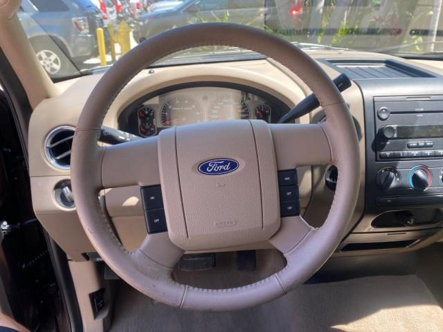 2006 Black /Tan Ford F-150 XLT LOW MILES 61,649 (1FTPX12596N) with an 5.4L 3v EFI V8 Engine engine, Automatic transmission, located at 4701 North Dixie Hwy, Pompano Beach, FL, 33064, (954) 422-2889, 26.240938, -80.123474 - OUR WEBPAGE FLORIDACARS1.COM HAS OVER 100 PHOTOS AND FREE CARFAX LINK 2006 FORD F-150 XLT 6.5 FT BED LOADED VERY HANDY FOR WORK VIN: 1FTPX12596NA02804 1 F T P X 1 2 5 9 6 N A 0 2 8 0 4 4 DOOR EXTENDED CAB PICKUP 5.4L V8 F SOHC GASOLINE 19 MPG REAR WHEEL DRIVE Features ABS Brakes Air Conditioning All - Photo#50