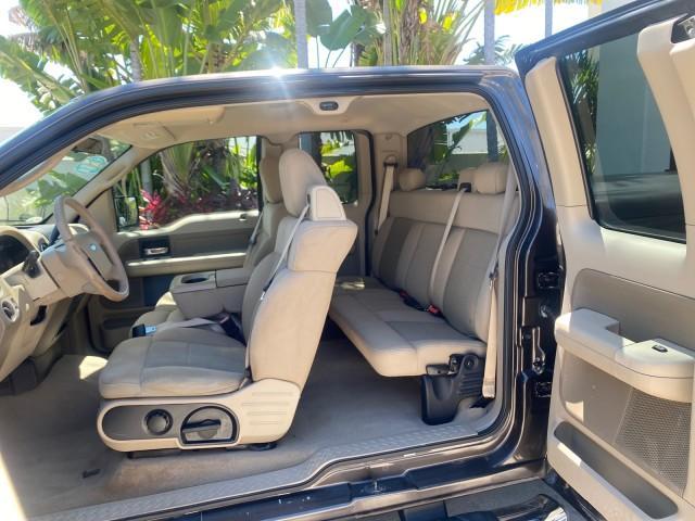 2006 Black /Tan Ford F-150 XLT LOW MILES 61,649 (1FTPX12596N) with an 5.4L 3v EFI V8 Engine engine, Automatic transmission, located at 4701 North Dixie Hwy, Pompano Beach, FL, 33064, (954) 422-2889, 26.240938, -80.123474 - OUR WEBPAGE FLORIDACARS1.COM HAS OVER 100 PHOTOS AND FREE CARFAX LINK 2006 FORD F-150 XLT 6.5 FT BED LOADED VERY HANDY FOR WORK VIN: 1FTPX12596NA02804 1 F T P X 1 2 5 9 6 N A 0 2 8 0 4 4 DOOR EXTENDED CAB PICKUP 5.4L V8 F SOHC GASOLINE 19 MPG REAR WHEEL DRIVE Features ABS Brakes Air Conditioning All - Photo#75