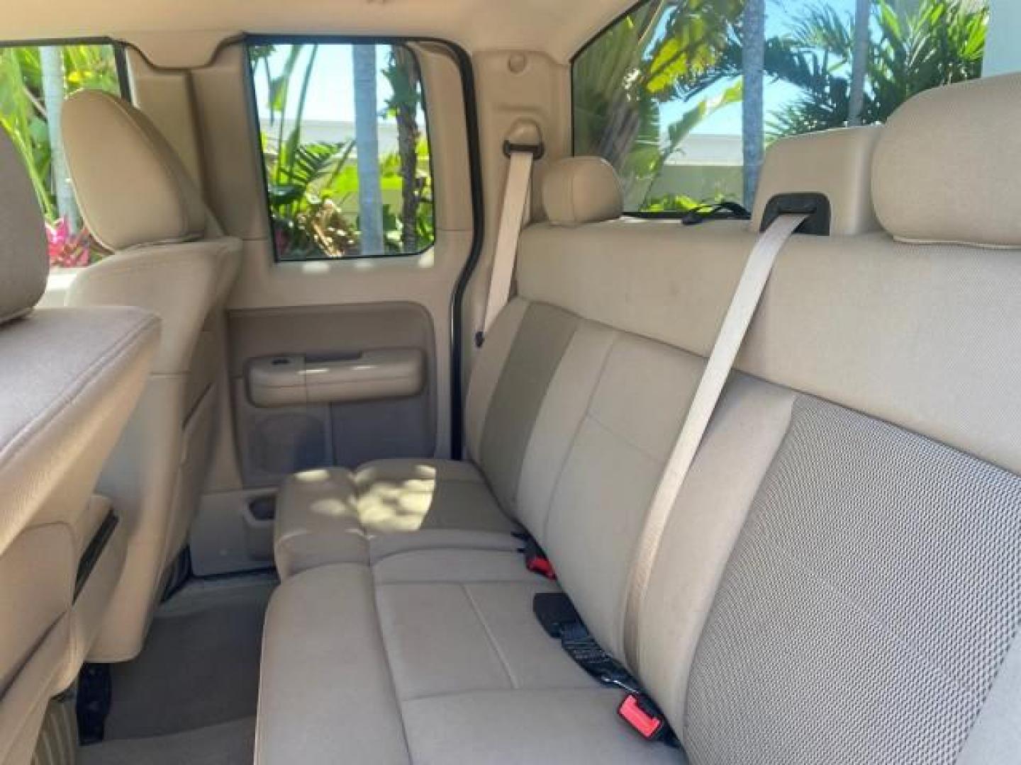 2006 Black /Tan Ford F-150 XLT LOW MILES 61,649 (1FTPX12596N) with an 5.4L 3v EFI V8 Engine engine, Automatic transmission, located at 4701 North Dixie Hwy, Pompano Beach, FL, 33064, (954) 422-2889, 26.240938, -80.123474 - OUR WEBPAGE FLORIDACARS1.COM HAS OVER 100 PHOTOS AND FREE CARFAX LINK 2006 FORD F-150 XLT 6.5 FT BED LOADED VERY HANDY FOR WORK VIN: 1FTPX12596NA02804 1 F T P X 1 2 5 9 6 N A 0 2 8 0 4 4 DOOR EXTENDED CAB PICKUP 5.4L V8 F SOHC GASOLINE 19 MPG REAR WHEEL DRIVE Features ABS Brakes Air Conditioning All - Photo#78