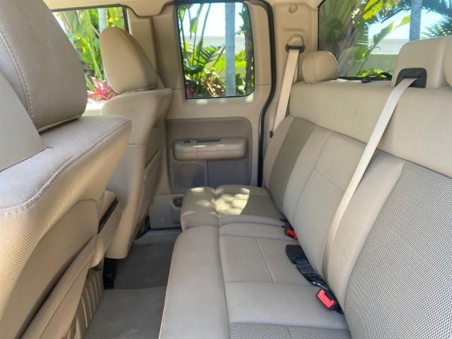 2006 Black /Tan Ford F-150 XLT LOW MILES 61,649 (1FTPX12596N) with an 5.4L 3v EFI V8 Engine engine, Automatic transmission, located at 4701 North Dixie Hwy, Pompano Beach, FL, 33064, (954) 422-2889, 26.240938, -80.123474 - OUR WEBPAGE FLORIDACARS1.COM HAS OVER 100 PHOTOS AND FREE CARFAX LINK 2006 FORD F-150 XLT 6.5 FT BED LOADED VERY HANDY FOR WORK VIN: 1FTPX12596NA02804 1 F T P X 1 2 5 9 6 N A 0 2 8 0 4 4 DOOR EXTENDED CAB PICKUP 5.4L V8 F SOHC GASOLINE 19 MPG REAR WHEEL DRIVE Features ABS Brakes Air Conditioning All - Photo#79