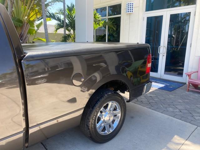 2006 Black /Tan Ford F-150 XLT LOW MILES 61,649 (1FTPX12596N) with an 5.4L 3v EFI V8 Engine engine, Automatic transmission, located at 4701 North Dixie Hwy, Pompano Beach, FL, 33064, (954) 422-2889, 26.240938, -80.123474 - OUR WEBPAGE FLORIDACARS1.COM HAS OVER 100 PHOTOS AND FREE CARFAX LINK 2006 FORD F-150 XLT 6.5 FT BED LOADED VERY HANDY FOR WORK VIN: 1FTPX12596NA02804 1 F T P X 1 2 5 9 6 N A 0 2 8 0 4 4 DOOR EXTENDED CAB PICKUP 5.4L V8 F SOHC GASOLINE 19 MPG REAR WHEEL DRIVE Features ABS Brakes Air Conditioning All - Photo#82