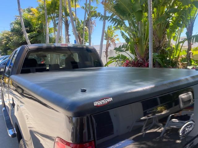 2006 Black /Tan Ford F-150 XLT LOW MILES 61,649 (1FTPX12596N) with an 5.4L 3v EFI V8 Engine engine, Automatic transmission, located at 4701 North Dixie Hwy, Pompano Beach, FL, 33064, (954) 422-2889, 26.240938, -80.123474 - OUR WEBPAGE FLORIDACARS1.COM HAS OVER 100 PHOTOS AND FREE CARFAX LINK 2006 FORD F-150 XLT 6.5 FT BED LOADED VERY HANDY FOR WORK VIN: 1FTPX12596NA02804 1 F T P X 1 2 5 9 6 N A 0 2 8 0 4 4 DOOR EXTENDED CAB PICKUP 5.4L V8 F SOHC GASOLINE 19 MPG REAR WHEEL DRIVE Features ABS Brakes Air Conditioning All - Photo#87
