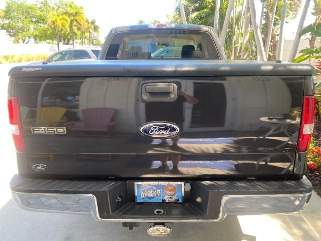 2006 Black /Tan Ford F-150 XLT LOW MILES 61,649 (1FTPX12596N) with an 5.4L 3v EFI V8 Engine engine, Automatic transmission, located at 4701 North Dixie Hwy, Pompano Beach, FL, 33064, (954) 422-2889, 26.240938, -80.123474 - OUR WEBPAGE FLORIDACARS1.COM HAS OVER 100 PHOTOS AND FREE CARFAX LINK 2006 FORD F-150 XLT 6.5 FT BED LOADED VERY HANDY FOR WORK VIN: 1FTPX12596NA02804 1 F T P X 1 2 5 9 6 N A 0 2 8 0 4 4 DOOR EXTENDED CAB PICKUP 5.4L V8 F SOHC GASOLINE 19 MPG REAR WHEEL DRIVE Features ABS Brakes Air Conditioning All - Photo#94