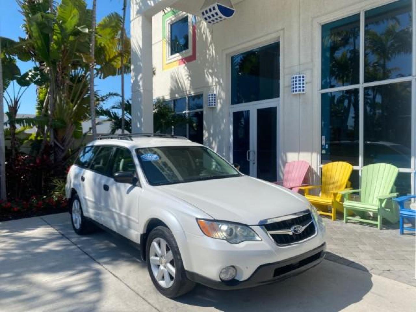 2009 Satin White Pearl /Taupe Subaru Outback Special Edition LOW MILES 68,114 (4S4BP61C697) with an 2.5L SOHC SMPI 16-Valve 4-Cyl Boxer Engine engine, Automatic transmission, located at 4701 North Dixie Hwy, Pompano Beach, FL, 33064, (954) 422-2889, 26.240938, -80.123474 - OUR WEBPAGE FLORIDACARS1.COM HAS OVER 100 PHOTOS AND FREE CARFAX LINK 2009 Subaru Outback 2.5I Special Edition 4WD VIN: 4S4BP61C697310640 4 Door Wagon/Sport Utility 2.5L H4 F SOHC 16V Gasoline 26 MPG All Wheel Drive Features 4WD/AWD ABS Brakes Air Conditioning Alloy Wheels AM/FM Stereo Automatic Tra - Photo#1