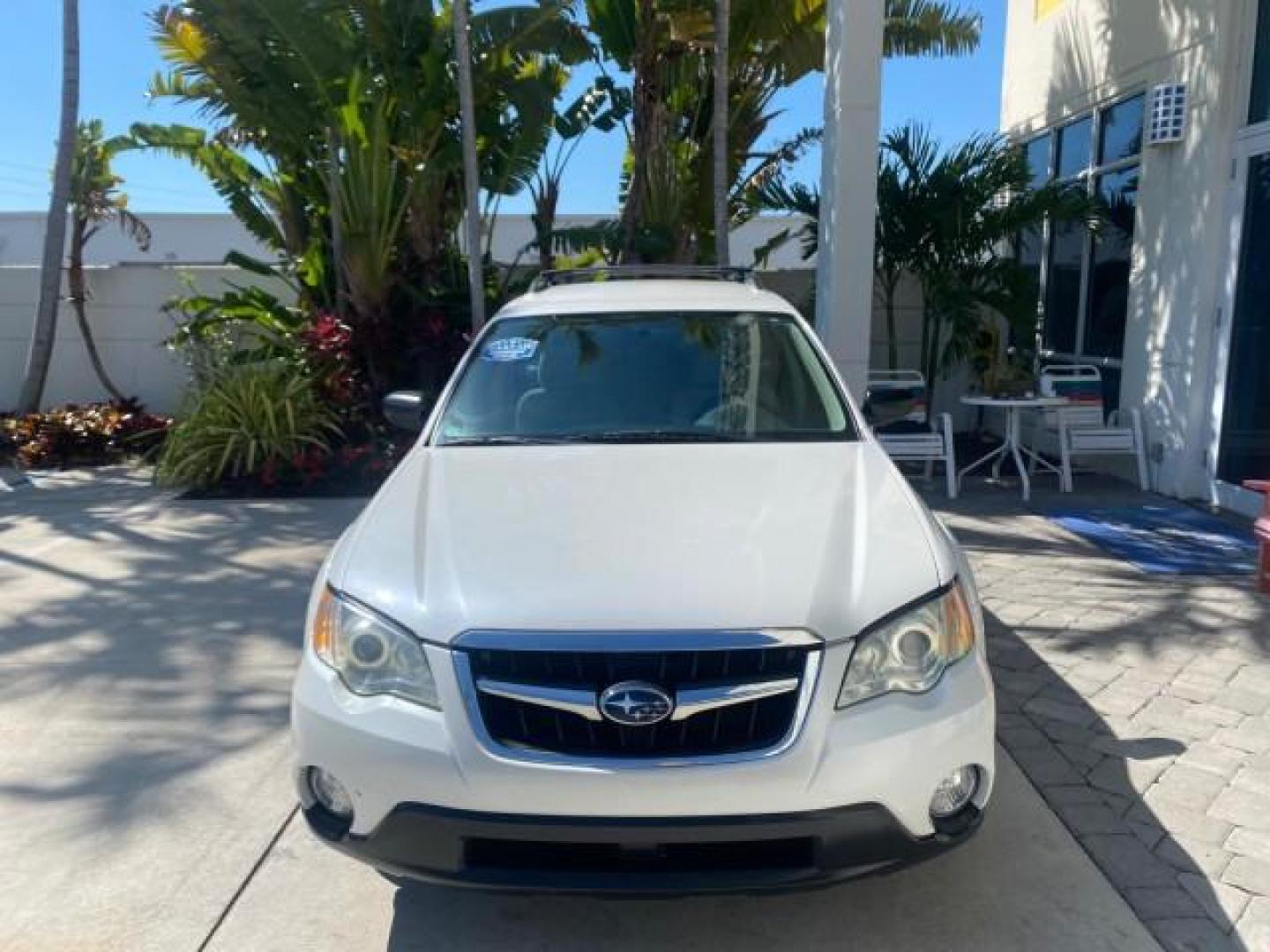 2009 Satin White Pearl /Taupe Subaru Outback Special Edition LOW MILES 68,114 (4S4BP61C697) with an 2.5L SOHC SMPI 16-Valve 4-Cyl Boxer Engine engine, Automatic transmission, located at 4701 North Dixie Hwy, Pompano Beach, FL, 33064, (954) 422-2889, 26.240938, -80.123474 - OUR WEBPAGE FLORIDACARS1.COM HAS OVER 100 PHOTOS AND FREE CARFAX LINK 2009 Subaru Outback 2.5I Special Edition 4WD VIN: 4S4BP61C697310640 4 Door Wagon/Sport Utility 2.5L H4 F SOHC 16V Gasoline 26 MPG All Wheel Drive Features 4WD/AWD ABS Brakes Air Conditioning Alloy Wheels AM/FM Stereo Automatic Tra - Photo#2