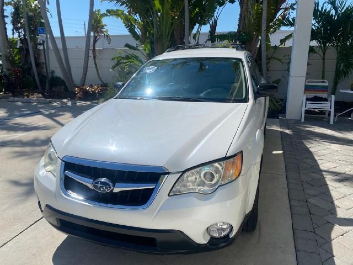 2009 Satin White Pearl /Taupe Subaru Outback Special Edition LOW MILES 68,114 (4S4BP61C697) with an 2.5L SOHC SMPI 16-Valve 4-Cyl Boxer Engine engine, Automatic transmission, located at 4701 North Dixie Hwy, Pompano Beach, FL, 33064, (954) 422-2889, 26.240938, -80.123474 - OUR WEBPAGE FLORIDACARS1.COM HAS OVER 100 PHOTOS AND FREE CARFAX LINK 2009 Subaru Outback 2.5I Special Edition 4WD VIN: 4S4BP61C697310640 4 Door Wagon/Sport Utility 2.5L H4 F SOHC 16V Gasoline 26 MPG All Wheel Drive Features 4WD/AWD ABS Brakes Air Conditioning Alloy Wheels AM/FM Stereo Automatic Tra - Photo#3