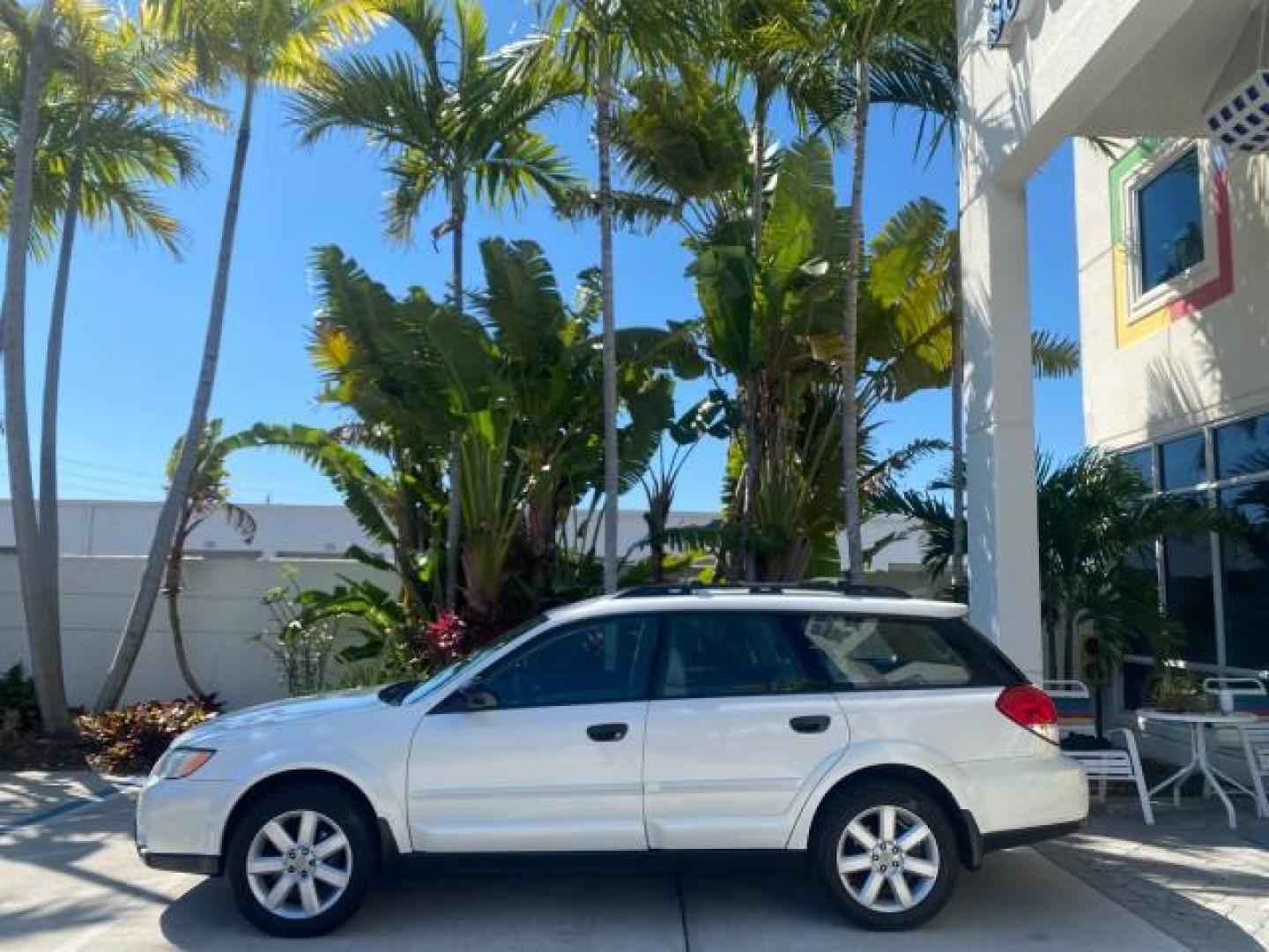 2009 Satin White Pearl /Taupe Subaru Outback Special Edition LOW MILES 68,114 (4S4BP61C697) with an 2.5L SOHC SMPI 16-Valve 4-Cyl Boxer Engine engine, Automatic transmission, located at 4701 North Dixie Hwy, Pompano Beach, FL, 33064, (954) 422-2889, 26.240938, -80.123474 - OUR WEBPAGE FLORIDACARS1.COM HAS OVER 100 PHOTOS AND FREE CARFAX LINK 2009 Subaru Outback 2.5I Special Edition 4WD VIN: 4S4BP61C697310640 4 Door Wagon/Sport Utility 2.5L H4 F SOHC 16V Gasoline 26 MPG All Wheel Drive Features 4WD/AWD ABS Brakes Air Conditioning Alloy Wheels AM/FM Stereo Automatic Tra - Photo#4