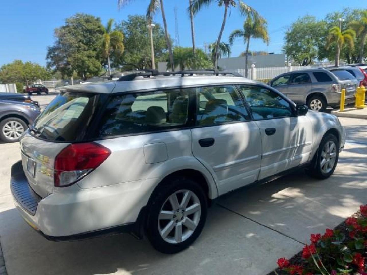 2009 Satin White Pearl /Taupe Subaru Outback Special Edition LOW MILES 68,114 (4S4BP61C697) with an 2.5L SOHC SMPI 16-Valve 4-Cyl Boxer Engine engine, Automatic transmission, located at 4701 North Dixie Hwy, Pompano Beach, FL, 33064, (954) 422-2889, 26.240938, -80.123474 - OUR WEBPAGE FLORIDACARS1.COM HAS OVER 100 PHOTOS AND FREE CARFAX LINK 2009 Subaru Outback 2.5I Special Edition 4WD VIN: 4S4BP61C697310640 4 Door Wagon/Sport Utility 2.5L H4 F SOHC 16V Gasoline 26 MPG All Wheel Drive Features 4WD/AWD ABS Brakes Air Conditioning Alloy Wheels AM/FM Stereo Automatic Tra - Photo#7