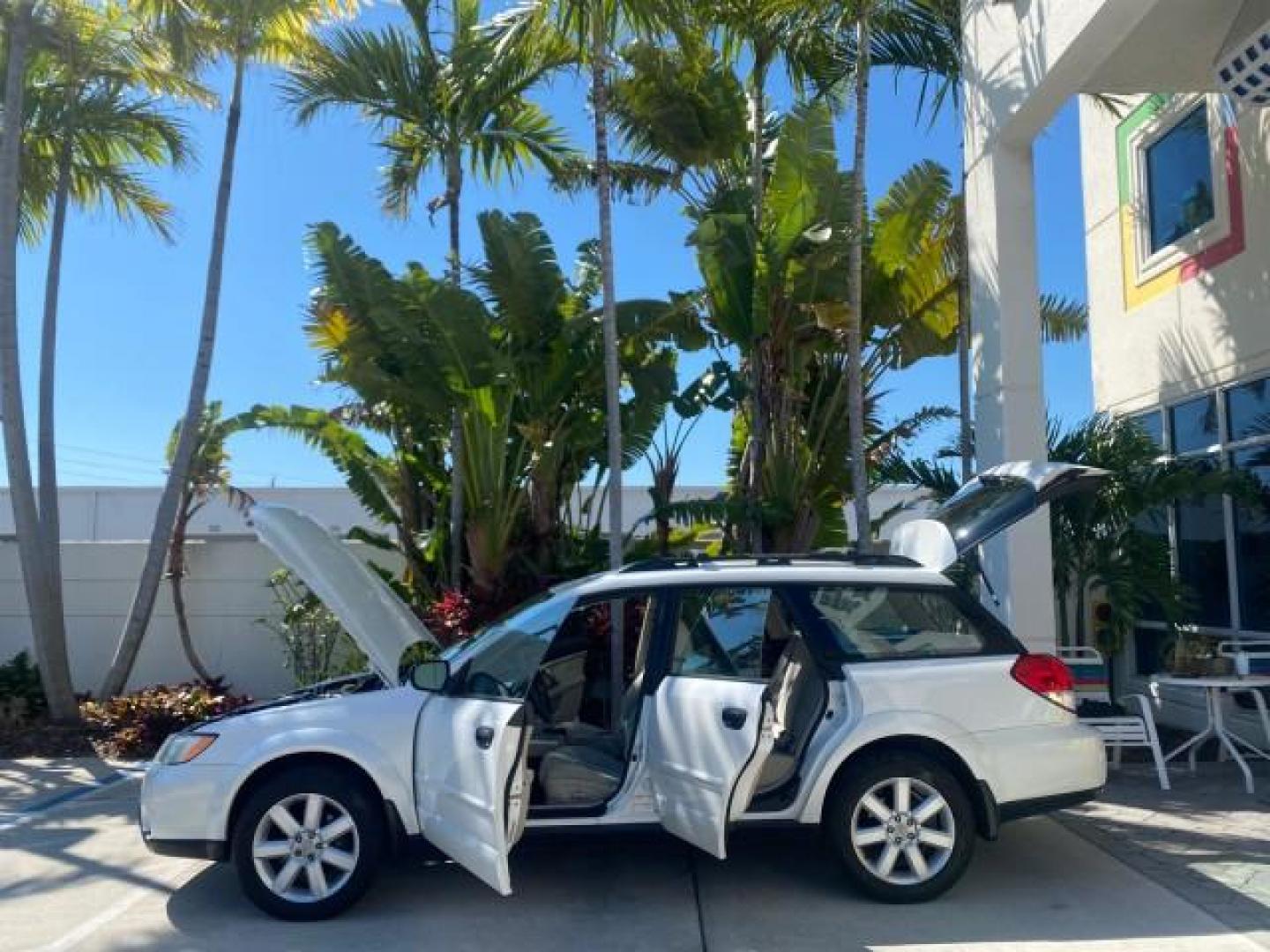 2009 Satin White Pearl /Taupe Subaru Outback Special Edition LOW MILES 68,114 (4S4BP61C697) with an 2.5L SOHC SMPI 16-Valve 4-Cyl Boxer Engine engine, Automatic transmission, located at 4701 North Dixie Hwy, Pompano Beach, FL, 33064, (954) 422-2889, 26.240938, -80.123474 - OUR WEBPAGE FLORIDACARS1.COM HAS OVER 100 PHOTOS AND FREE CARFAX LINK 2009 Subaru Outback 2.5I Special Edition 4WD VIN: 4S4BP61C697310640 4 Door Wagon/Sport Utility 2.5L H4 F SOHC 16V Gasoline 26 MPG All Wheel Drive Features 4WD/AWD ABS Brakes Air Conditioning Alloy Wheels AM/FM Stereo Automatic Tra - Photo#8