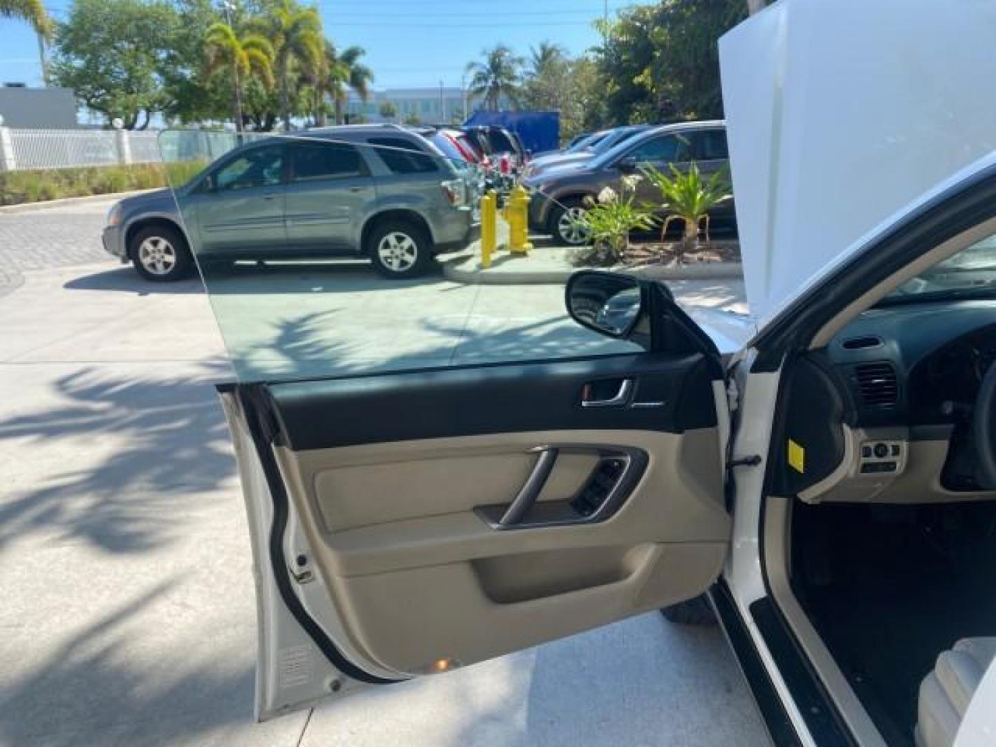 2009 Satin White Pearl /Taupe Subaru Outback Special Edition LOW MILES 68,114 (4S4BP61C697) with an 2.5L SOHC SMPI 16-Valve 4-Cyl Boxer Engine engine, Automatic transmission, located at 4701 North Dixie Hwy, Pompano Beach, FL, 33064, (954) 422-2889, 26.240938, -80.123474 - OUR WEBPAGE FLORIDACARS1.COM HAS OVER 100 PHOTOS AND FREE CARFAX LINK 2009 Subaru Outback 2.5I Special Edition 4WD VIN: 4S4BP61C697310640 4 Door Wagon/Sport Utility 2.5L H4 F SOHC 16V Gasoline 26 MPG All Wheel Drive Features 4WD/AWD ABS Brakes Air Conditioning Alloy Wheels AM/FM Stereo Automatic Tra - Photo#9