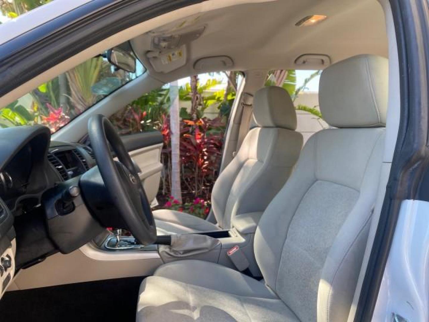 2009 Satin White Pearl /Taupe Subaru Outback Special Edition LOW MILES 68,114 (4S4BP61C697) with an 2.5L SOHC SMPI 16-Valve 4-Cyl Boxer Engine engine, Automatic transmission, located at 4701 North Dixie Hwy, Pompano Beach, FL, 33064, (954) 422-2889, 26.240938, -80.123474 - OUR WEBPAGE FLORIDACARS1.COM HAS OVER 100 PHOTOS AND FREE CARFAX LINK 2009 Subaru Outback 2.5I Special Edition 4WD VIN: 4S4BP61C697310640 4 Door Wagon/Sport Utility 2.5L H4 F SOHC 16V Gasoline 26 MPG All Wheel Drive Features 4WD/AWD ABS Brakes Air Conditioning Alloy Wheels AM/FM Stereo Automatic Tra - Photo#10