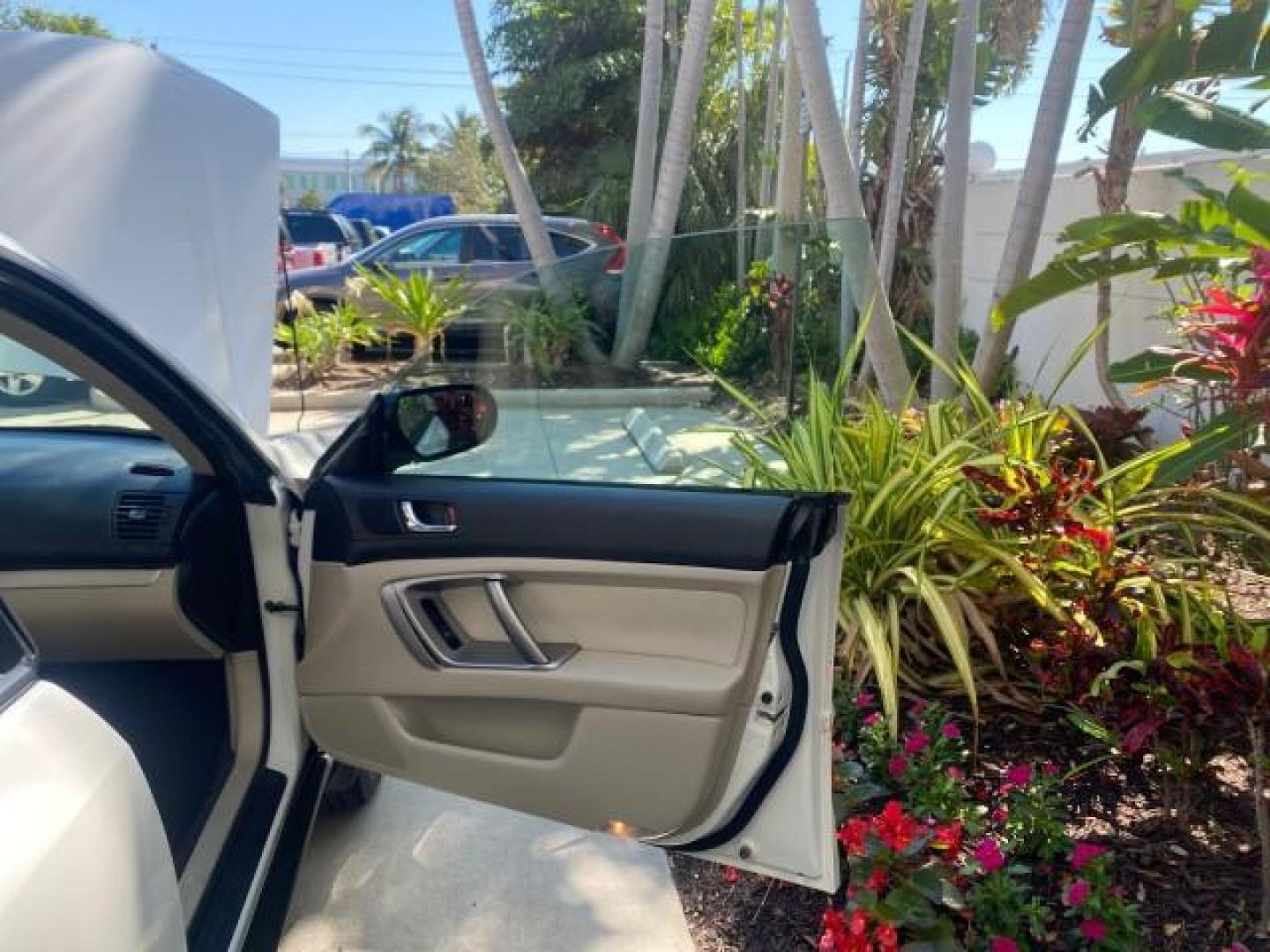 2009 Satin White Pearl /Taupe Subaru Outback Special Edition LOW MILES 68,114 (4S4BP61C697) with an 2.5L SOHC SMPI 16-Valve 4-Cyl Boxer Engine engine, Automatic transmission, located at 4701 North Dixie Hwy, Pompano Beach, FL, 33064, (954) 422-2889, 26.240938, -80.123474 - OUR WEBPAGE FLORIDACARS1.COM HAS OVER 100 PHOTOS AND FREE CARFAX LINK 2009 Subaru Outback 2.5I Special Edition 4WD VIN: 4S4BP61C697310640 4 Door Wagon/Sport Utility 2.5L H4 F SOHC 16V Gasoline 26 MPG All Wheel Drive Features 4WD/AWD ABS Brakes Air Conditioning Alloy Wheels AM/FM Stereo Automatic Tra - Photo#11