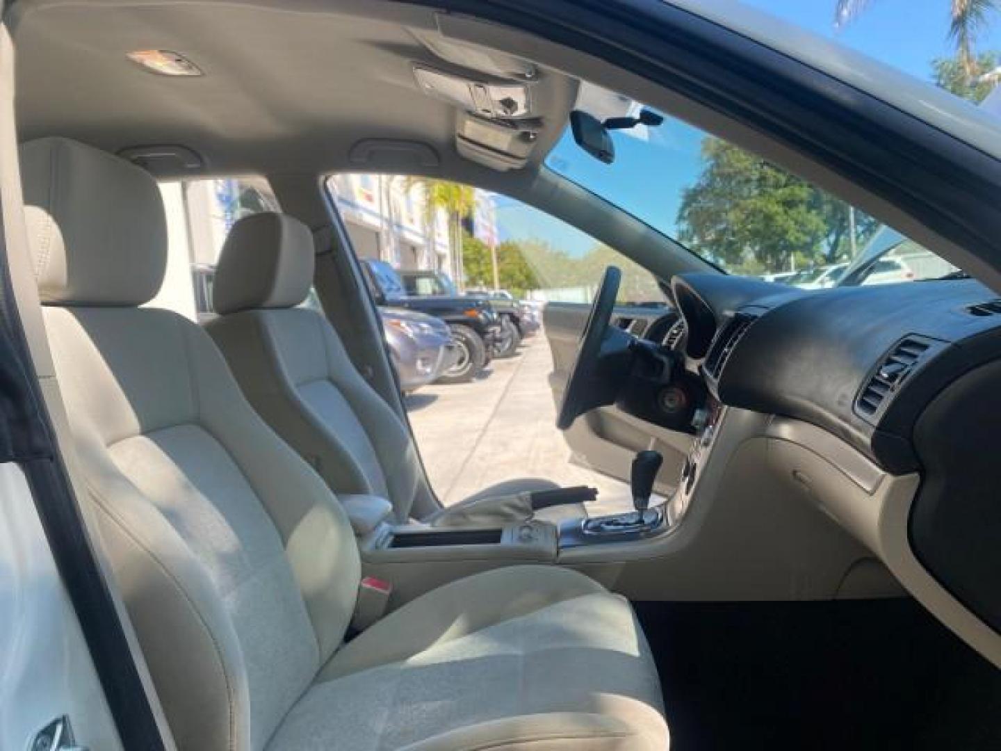 2009 Satin White Pearl /Taupe Subaru Outback Special Edition LOW MILES 68,114 (4S4BP61C697) with an 2.5L SOHC SMPI 16-Valve 4-Cyl Boxer Engine engine, Automatic transmission, located at 4701 North Dixie Hwy, Pompano Beach, FL, 33064, (954) 422-2889, 26.240938, -80.123474 - OUR WEBPAGE FLORIDACARS1.COM HAS OVER 100 PHOTOS AND FREE CARFAX LINK 2009 Subaru Outback 2.5I Special Edition 4WD VIN: 4S4BP61C697310640 4 Door Wagon/Sport Utility 2.5L H4 F SOHC 16V Gasoline 26 MPG All Wheel Drive Features 4WD/AWD ABS Brakes Air Conditioning Alloy Wheels AM/FM Stereo Automatic Tra - Photo#12