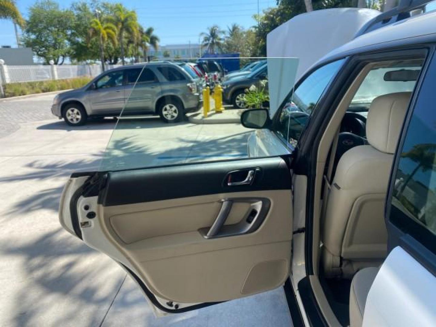 2009 Satin White Pearl /Taupe Subaru Outback Special Edition LOW MILES 68,114 (4S4BP61C697) with an 2.5L SOHC SMPI 16-Valve 4-Cyl Boxer Engine engine, Automatic transmission, located at 4701 North Dixie Hwy, Pompano Beach, FL, 33064, (954) 422-2889, 26.240938, -80.123474 - OUR WEBPAGE FLORIDACARS1.COM HAS OVER 100 PHOTOS AND FREE CARFAX LINK 2009 Subaru Outback 2.5I Special Edition 4WD VIN: 4S4BP61C697310640 4 Door Wagon/Sport Utility 2.5L H4 F SOHC 16V Gasoline 26 MPG All Wheel Drive Features 4WD/AWD ABS Brakes Air Conditioning Alloy Wheels AM/FM Stereo Automatic Tra - Photo#13