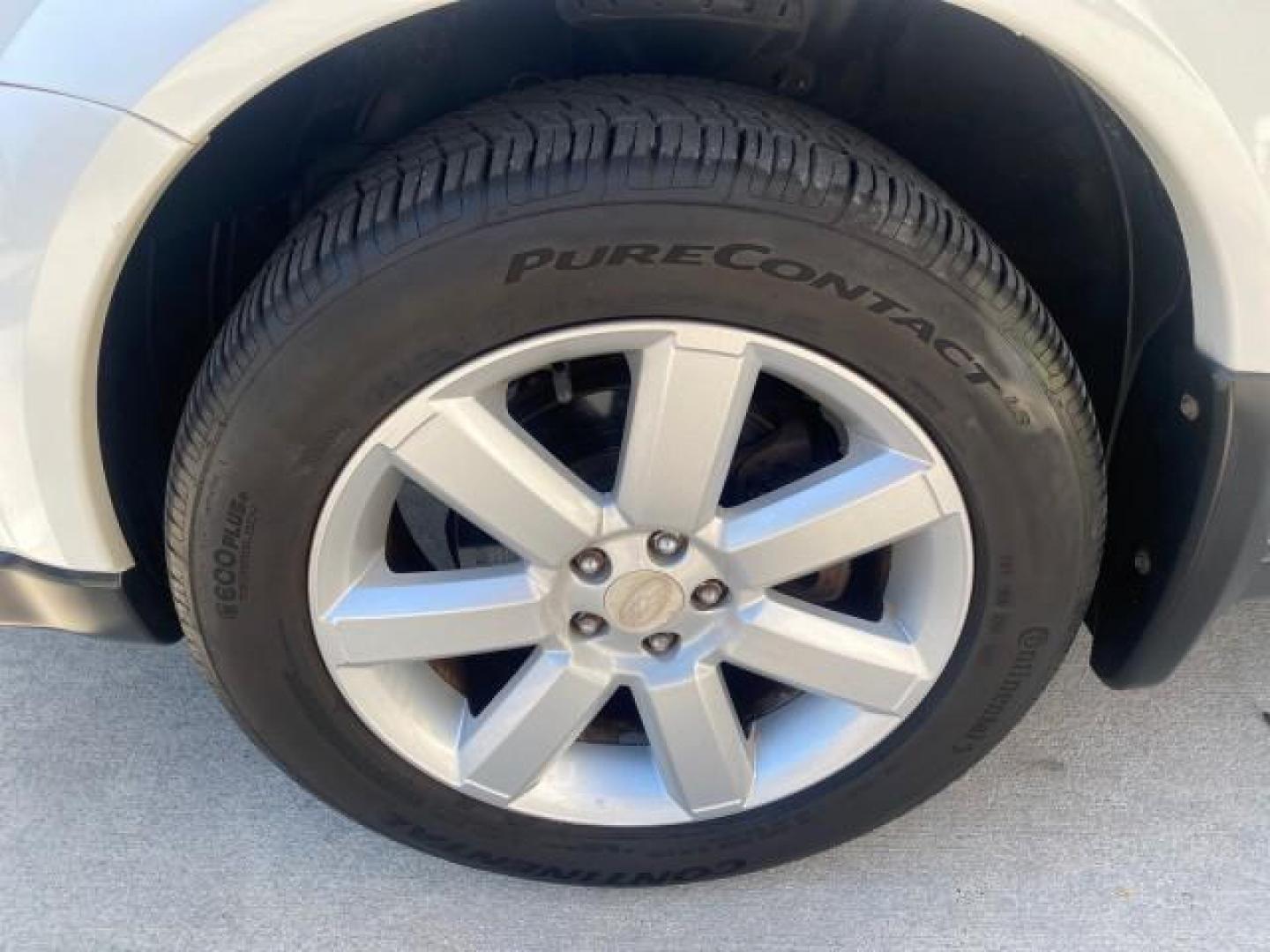 2009 Satin White Pearl /Taupe Subaru Outback Special Edition LOW MILES 68,114 (4S4BP61C697) with an 2.5L SOHC SMPI 16-Valve 4-Cyl Boxer Engine engine, Automatic transmission, located at 4701 North Dixie Hwy, Pompano Beach, FL, 33064, (954) 422-2889, 26.240938, -80.123474 - OUR WEBPAGE FLORIDACARS1.COM HAS OVER 100 PHOTOS AND FREE CARFAX LINK 2009 Subaru Outback 2.5I Special Edition 4WD VIN: 4S4BP61C697310640 4 Door Wagon/Sport Utility 2.5L H4 F SOHC 16V Gasoline 26 MPG All Wheel Drive Features 4WD/AWD ABS Brakes Air Conditioning Alloy Wheels AM/FM Stereo Automatic Tra - Photo#19