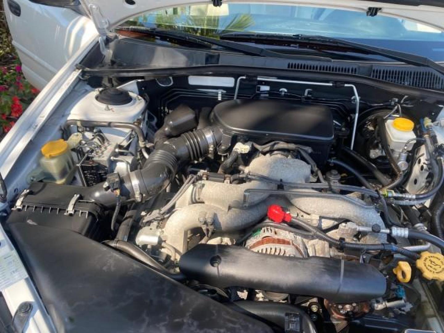 2009 Satin White Pearl /Taupe Subaru Outback Special Edition LOW MILES 68,114 (4S4BP61C697) with an 2.5L SOHC SMPI 16-Valve 4-Cyl Boxer Engine engine, Automatic transmission, located at 4701 North Dixie Hwy, Pompano Beach, FL, 33064, (954) 422-2889, 26.240938, -80.123474 - OUR WEBPAGE FLORIDACARS1.COM HAS OVER 100 PHOTOS AND FREE CARFAX LINK 2009 Subaru Outback 2.5I Special Edition 4WD VIN: 4S4BP61C697310640 4 Door Wagon/Sport Utility 2.5L H4 F SOHC 16V Gasoline 26 MPG All Wheel Drive Features 4WD/AWD ABS Brakes Air Conditioning Alloy Wheels AM/FM Stereo Automatic Tra - Photo#24