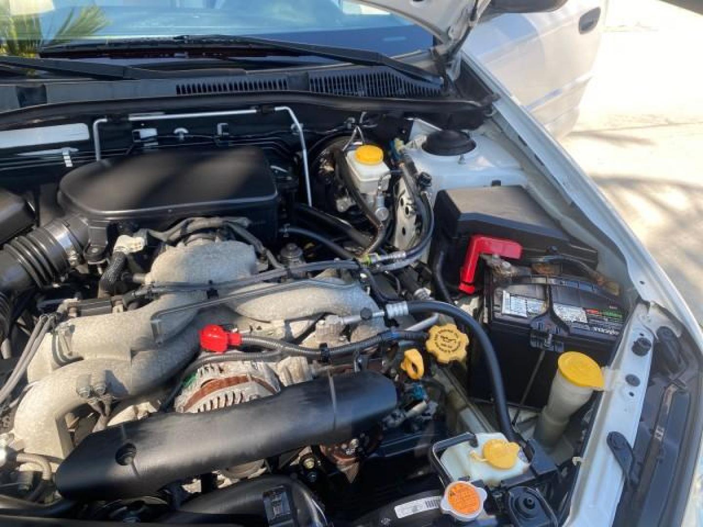 2009 Satin White Pearl /Taupe Subaru Outback Special Edition LOW MILES 68,114 (4S4BP61C697) with an 2.5L SOHC SMPI 16-Valve 4-Cyl Boxer Engine engine, Automatic transmission, located at 4701 North Dixie Hwy, Pompano Beach, FL, 33064, (954) 422-2889, 26.240938, -80.123474 - OUR WEBPAGE FLORIDACARS1.COM HAS OVER 100 PHOTOS AND FREE CARFAX LINK 2009 Subaru Outback 2.5I Special Edition 4WD VIN: 4S4BP61C697310640 4 Door Wagon/Sport Utility 2.5L H4 F SOHC 16V Gasoline 26 MPG All Wheel Drive Features 4WD/AWD ABS Brakes Air Conditioning Alloy Wheels AM/FM Stereo Automatic Tra - Photo#25