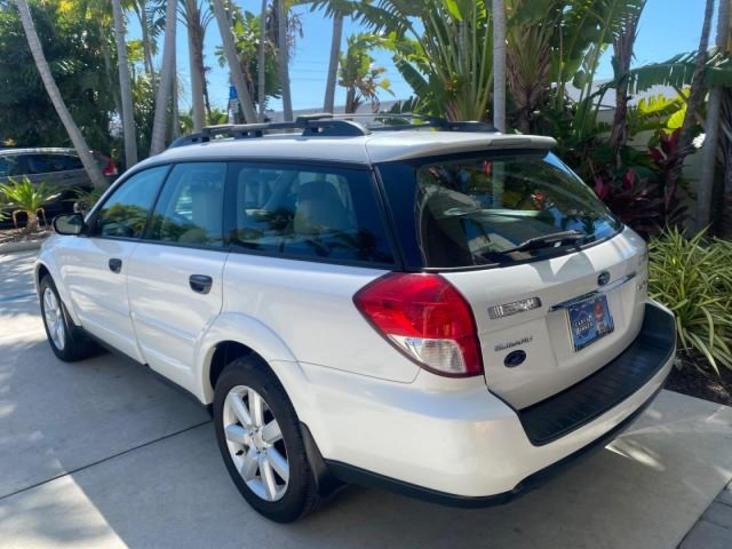 2009 Satin White Pearl /Taupe Subaru Outback Special Edition LOW MILES 68,114 (4S4BP61C697) with an 2.5L SOHC SMPI 16-Valve 4-Cyl Boxer Engine engine, Automatic transmission, located at 4701 North Dixie Hwy, Pompano Beach, FL, 33064, (954) 422-2889, 26.240938, -80.123474 - OUR WEBPAGE FLORIDACARS1.COM HAS OVER 100 PHOTOS AND FREE CARFAX LINK 2009 Subaru Outback 2.5I Special Edition 4WD VIN: 4S4BP61C697310640 4 Door Wagon/Sport Utility 2.5L H4 F SOHC 16V Gasoline 26 MPG All Wheel Drive Features 4WD/AWD ABS Brakes Air Conditioning Alloy Wheels AM/FM Stereo Automatic Tra - Photo#33
