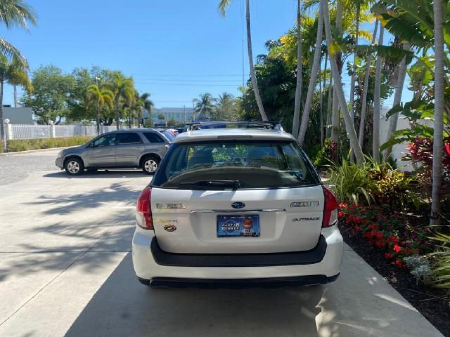 2009 Satin White Pearl /Taupe Subaru Outback Special Edition LOW MILES 68,114 (4S4BP61C697) with an 2.5L SOHC SMPI 16-Valve 4-Cyl Boxer Engine engine, Automatic transmission, located at 4701 North Dixie Hwy, Pompano Beach, FL, 33064, (954) 422-2889, 26.240938, -80.123474 - OUR WEBPAGE FLORIDACARS1.COM HAS OVER 100 PHOTOS AND FREE CARFAX LINK 2009 Subaru Outback 2.5I Special Edition 4WD VIN: 4S4BP61C697310640 4 Door Wagon/Sport Utility 2.5L H4 F SOHC 16V Gasoline 26 MPG All Wheel Drive Features 4WD/AWD ABS Brakes Air Conditioning Alloy Wheels AM/FM Stereo Automatic Tra - Photo#34