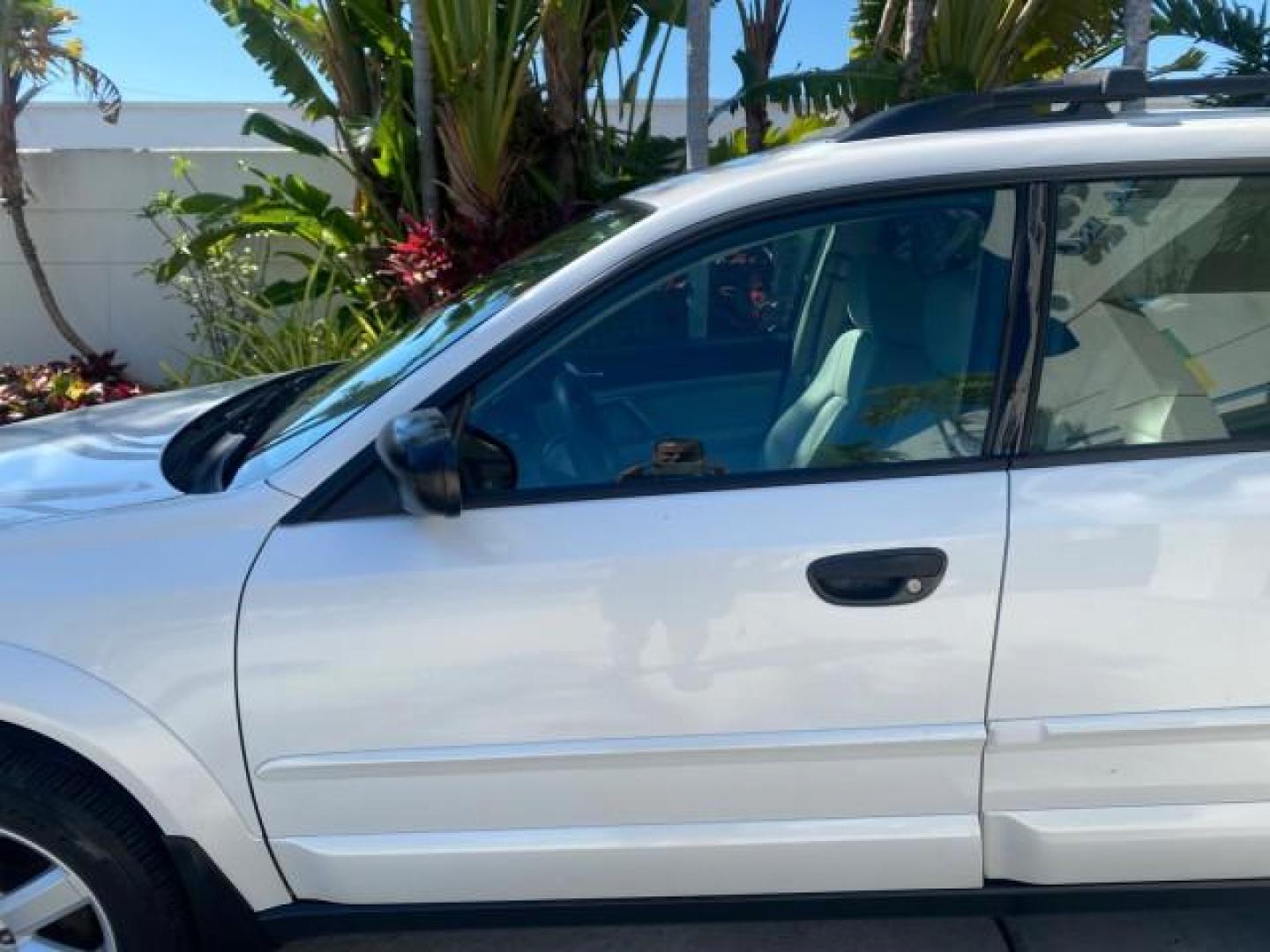 2009 Satin White Pearl /Taupe Subaru Outback Special Edition LOW MILES 68,114 (4S4BP61C697) with an 2.5L SOHC SMPI 16-Valve 4-Cyl Boxer Engine engine, Automatic transmission, located at 4701 North Dixie Hwy, Pompano Beach, FL, 33064, (954) 422-2889, 26.240938, -80.123474 - OUR WEBPAGE FLORIDACARS1.COM HAS OVER 100 PHOTOS AND FREE CARFAX LINK 2009 Subaru Outback 2.5I Special Edition 4WD VIN: 4S4BP61C697310640 4 Door Wagon/Sport Utility 2.5L H4 F SOHC 16V Gasoline 26 MPG All Wheel Drive Features 4WD/AWD ABS Brakes Air Conditioning Alloy Wheels AM/FM Stereo Automatic Tra - Photo#37