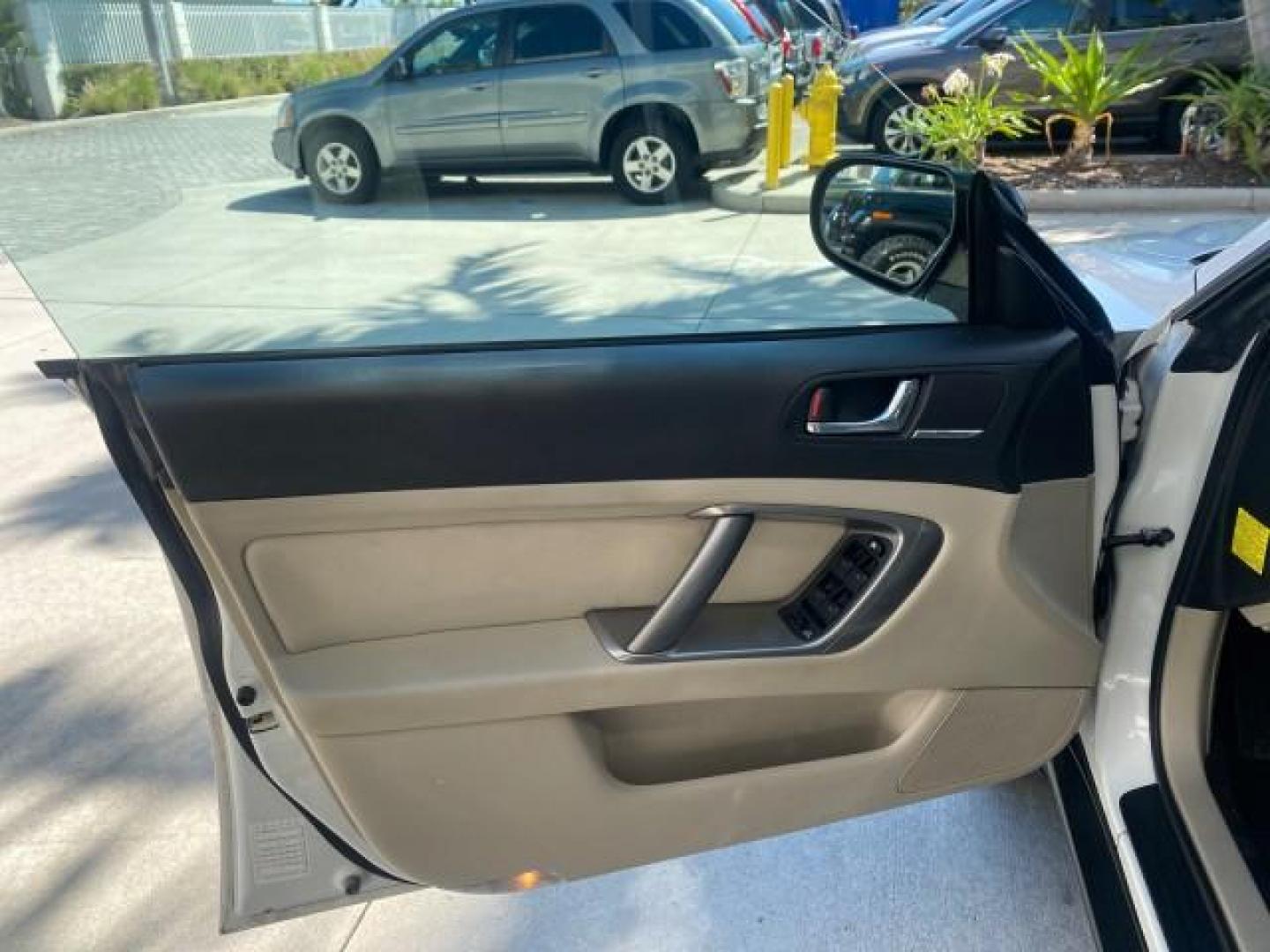 2009 Satin White Pearl /Taupe Subaru Outback Special Edition LOW MILES 68,114 (4S4BP61C697) with an 2.5L SOHC SMPI 16-Valve 4-Cyl Boxer Engine engine, Automatic transmission, located at 4701 North Dixie Hwy, Pompano Beach, FL, 33064, (954) 422-2889, 26.240938, -80.123474 - OUR WEBPAGE FLORIDACARS1.COM HAS OVER 100 PHOTOS AND FREE CARFAX LINK 2009 Subaru Outback 2.5I Special Edition 4WD VIN: 4S4BP61C697310640 4 Door Wagon/Sport Utility 2.5L H4 F SOHC 16V Gasoline 26 MPG All Wheel Drive Features 4WD/AWD ABS Brakes Air Conditioning Alloy Wheels AM/FM Stereo Automatic Tra - Photo#41