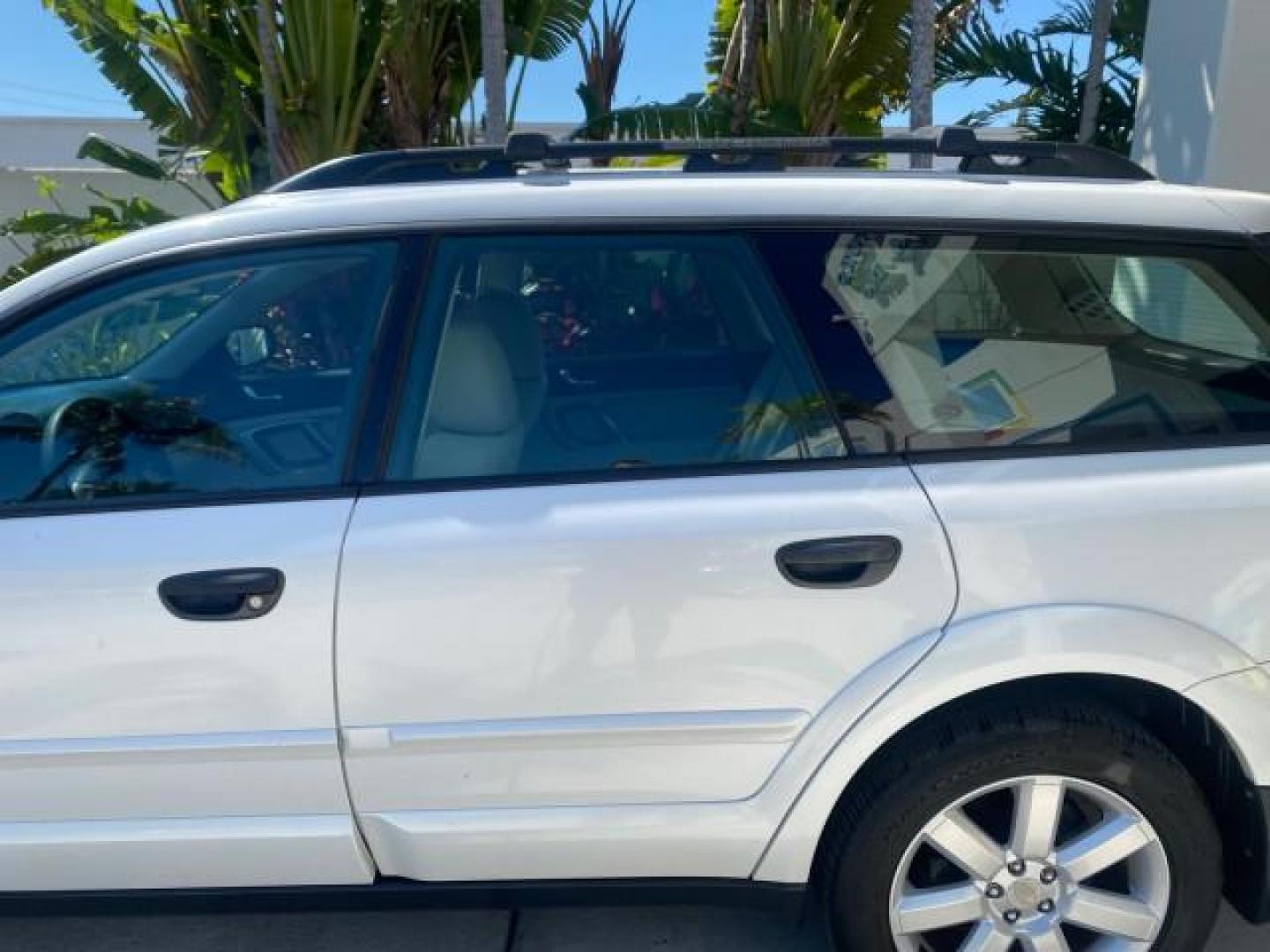 2009 Satin White Pearl /Taupe Subaru Outback Special Edition LOW MILES 68,114 (4S4BP61C697) with an 2.5L SOHC SMPI 16-Valve 4-Cyl Boxer Engine engine, Automatic transmission, located at 4701 North Dixie Hwy, Pompano Beach, FL, 33064, (954) 422-2889, 26.240938, -80.123474 - OUR WEBPAGE FLORIDACARS1.COM HAS OVER 100 PHOTOS AND FREE CARFAX LINK 2009 Subaru Outback 2.5I Special Edition 4WD VIN: 4S4BP61C697310640 4 Door Wagon/Sport Utility 2.5L H4 F SOHC 16V Gasoline 26 MPG All Wheel Drive Features 4WD/AWD ABS Brakes Air Conditioning Alloy Wheels AM/FM Stereo Automatic Tra - Photo#67