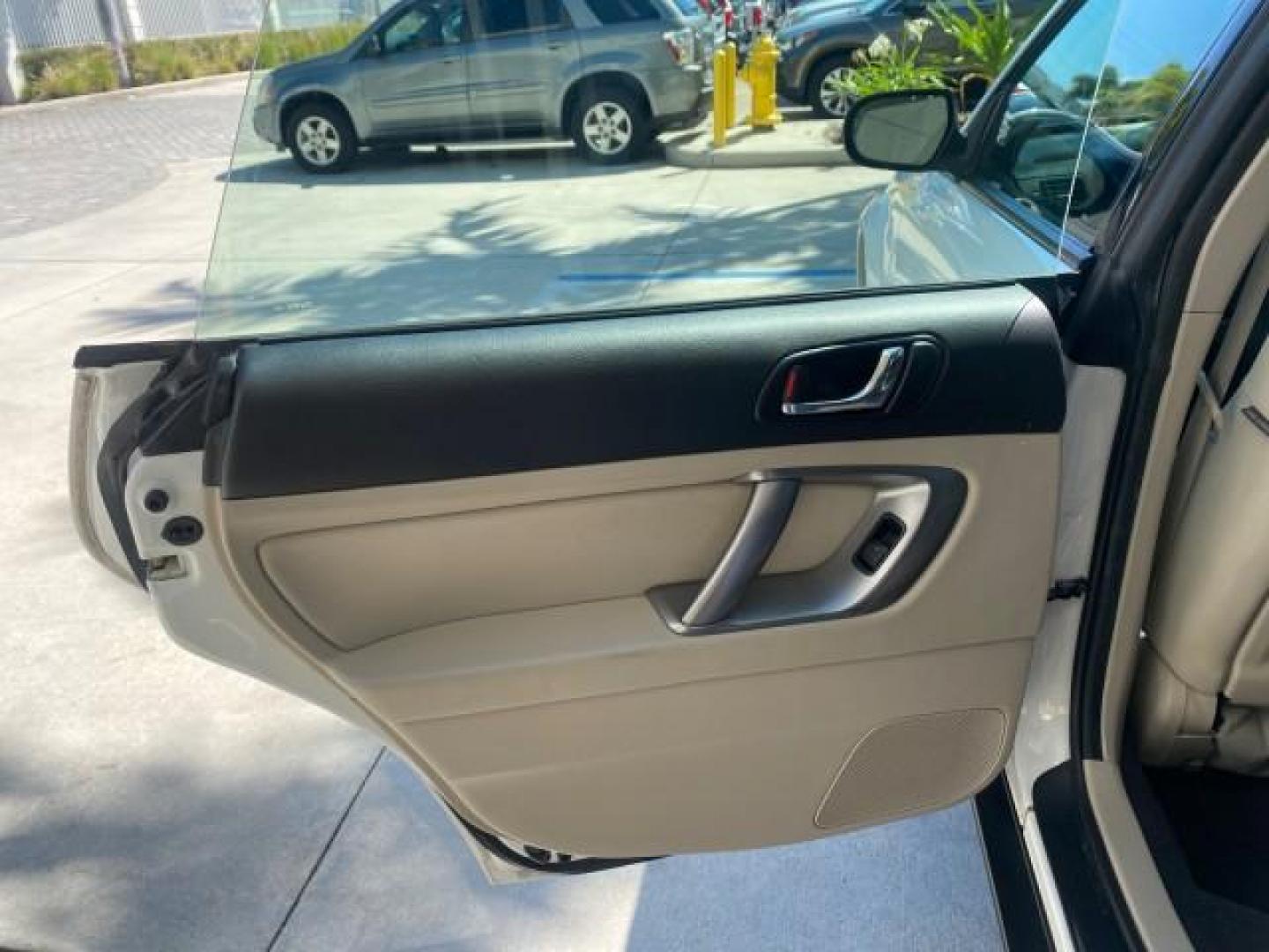 2009 Satin White Pearl /Taupe Subaru Outback Special Edition LOW MILES 68,114 (4S4BP61C697) with an 2.5L SOHC SMPI 16-Valve 4-Cyl Boxer Engine engine, Automatic transmission, located at 4701 North Dixie Hwy, Pompano Beach, FL, 33064, (954) 422-2889, 26.240938, -80.123474 - OUR WEBPAGE FLORIDACARS1.COM HAS OVER 100 PHOTOS AND FREE CARFAX LINK 2009 Subaru Outback 2.5I Special Edition 4WD VIN: 4S4BP61C697310640 4 Door Wagon/Sport Utility 2.5L H4 F SOHC 16V Gasoline 26 MPG All Wheel Drive Features 4WD/AWD ABS Brakes Air Conditioning Alloy Wheels AM/FM Stereo Automatic Tra - Photo#69