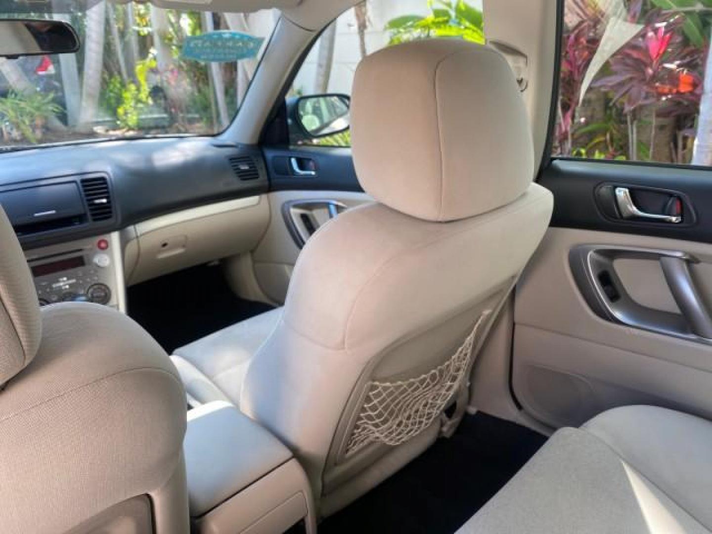 2009 Satin White Pearl /Taupe Subaru Outback Special Edition LOW MILES 68,114 (4S4BP61C697) with an 2.5L SOHC SMPI 16-Valve 4-Cyl Boxer Engine engine, Automatic transmission, located at 4701 North Dixie Hwy, Pompano Beach, FL, 33064, (954) 422-2889, 26.240938, -80.123474 - OUR WEBPAGE FLORIDACARS1.COM HAS OVER 100 PHOTOS AND FREE CARFAX LINK 2009 Subaru Outback 2.5I Special Edition 4WD VIN: 4S4BP61C697310640 4 Door Wagon/Sport Utility 2.5L H4 F SOHC 16V Gasoline 26 MPG All Wheel Drive Features 4WD/AWD ABS Brakes Air Conditioning Alloy Wheels AM/FM Stereo Automatic Tra - Photo#77