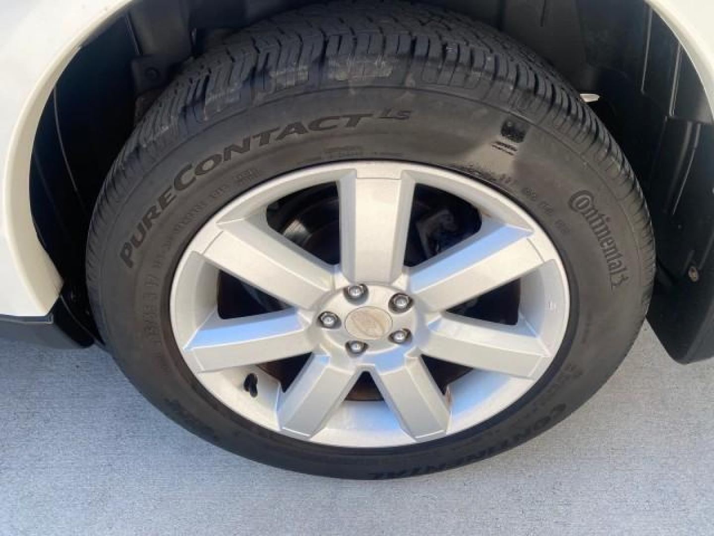 2009 Satin White Pearl /Taupe Subaru Outback Special Edition LOW MILES 68,114 (4S4BP61C697) with an 2.5L SOHC SMPI 16-Valve 4-Cyl Boxer Engine engine, Automatic transmission, located at 4701 North Dixie Hwy, Pompano Beach, FL, 33064, (954) 422-2889, 26.240938, -80.123474 - OUR WEBPAGE FLORIDACARS1.COM HAS OVER 100 PHOTOS AND FREE CARFAX LINK 2009 Subaru Outback 2.5I Special Edition 4WD VIN: 4S4BP61C697310640 4 Door Wagon/Sport Utility 2.5L H4 F SOHC 16V Gasoline 26 MPG All Wheel Drive Features 4WD/AWD ABS Brakes Air Conditioning Alloy Wheels AM/FM Stereo Automatic Tra - Photo#78