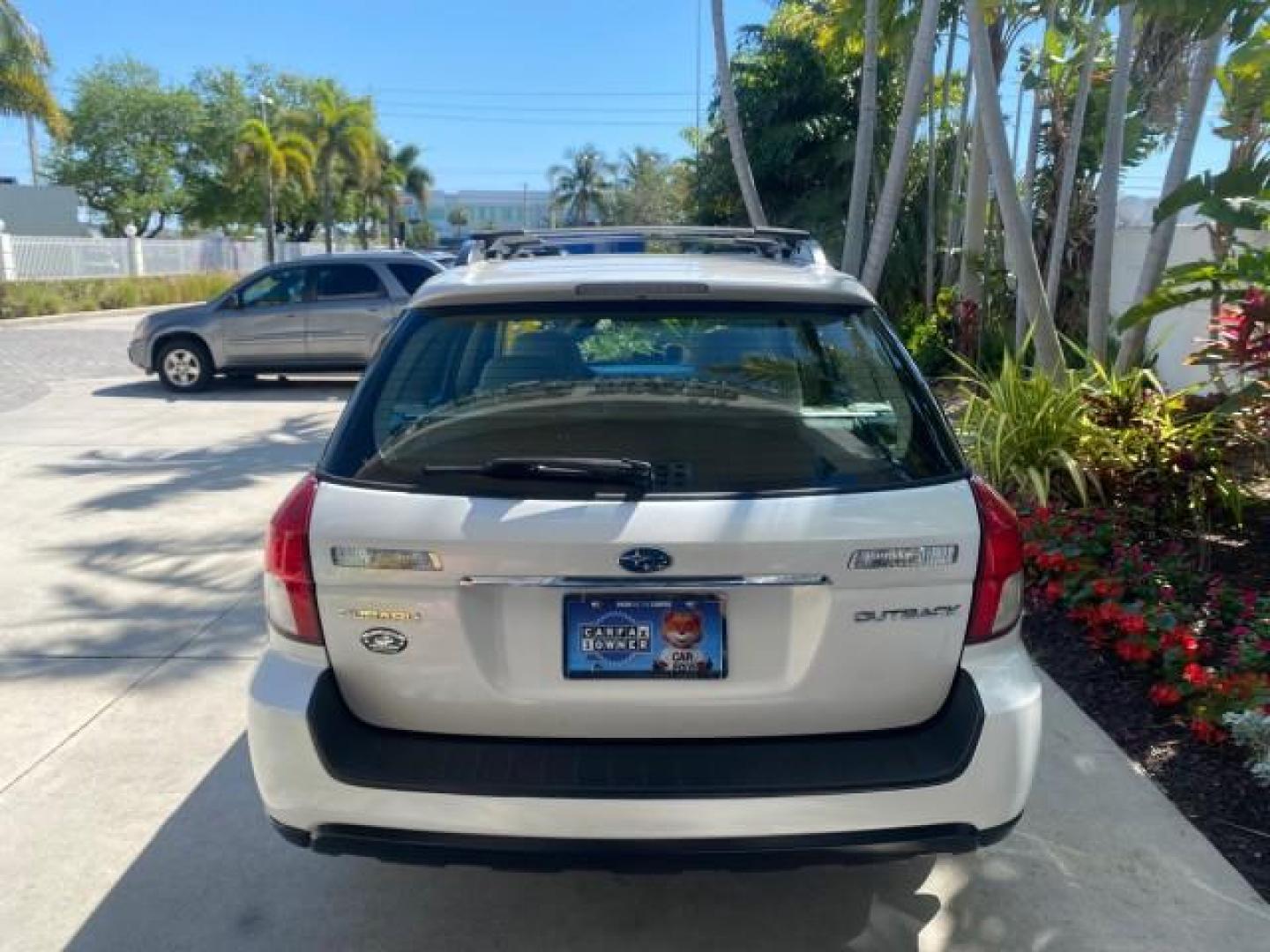 2009 Satin White Pearl /Taupe Subaru Outback Special Edition LOW MILES 68,114 (4S4BP61C697) with an 2.5L SOHC SMPI 16-Valve 4-Cyl Boxer Engine engine, Automatic transmission, located at 4701 North Dixie Hwy, Pompano Beach, FL, 33064, (954) 422-2889, 26.240938, -80.123474 - OUR WEBPAGE FLORIDACARS1.COM HAS OVER 100 PHOTOS AND FREE CARFAX LINK 2009 Subaru Outback 2.5I Special Edition 4WD VIN: 4S4BP61C697310640 4 Door Wagon/Sport Utility 2.5L H4 F SOHC 16V Gasoline 26 MPG All Wheel Drive Features 4WD/AWD ABS Brakes Air Conditioning Alloy Wheels AM/FM Stereo Automatic Tra - Photo#81