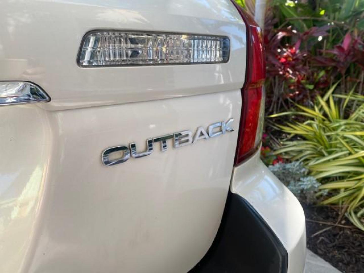 2009 Satin White Pearl /Taupe Subaru Outback Special Edition LOW MILES 68,114 (4S4BP61C697) with an 2.5L SOHC SMPI 16-Valve 4-Cyl Boxer Engine engine, Automatic transmission, located at 4701 North Dixie Hwy, Pompano Beach, FL, 33064, (954) 422-2889, 26.240938, -80.123474 - OUR WEBPAGE FLORIDACARS1.COM HAS OVER 100 PHOTOS AND FREE CARFAX LINK 2009 Subaru Outback 2.5I Special Edition 4WD VIN: 4S4BP61C697310640 4 Door Wagon/Sport Utility 2.5L H4 F SOHC 16V Gasoline 26 MPG All Wheel Drive Features 4WD/AWD ABS Brakes Air Conditioning Alloy Wheels AM/FM Stereo Automatic Tra - Photo#84