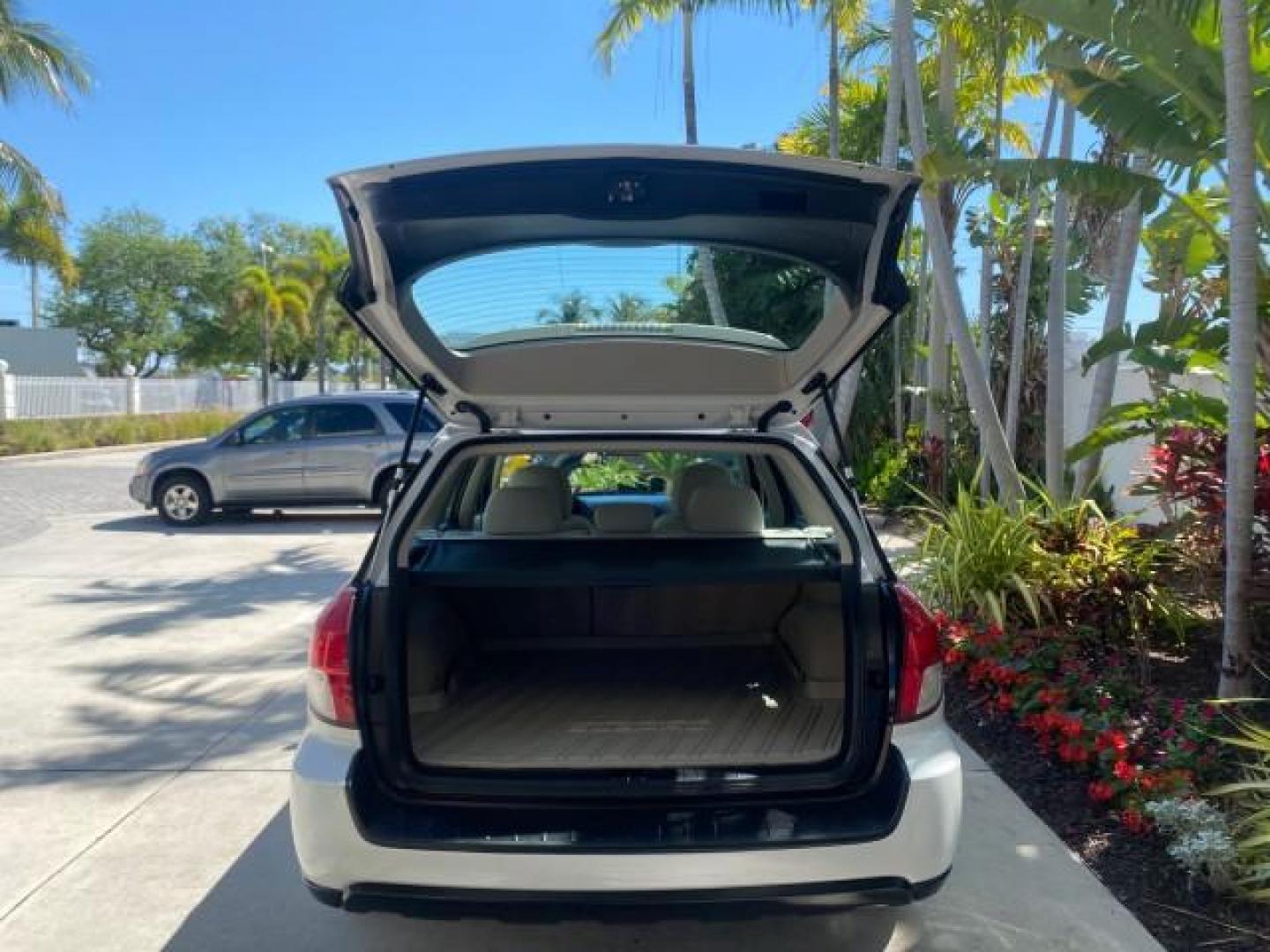 2009 Satin White Pearl /Taupe Subaru Outback Special Edition LOW MILES 68,114 (4S4BP61C697) with an 2.5L SOHC SMPI 16-Valve 4-Cyl Boxer Engine engine, Automatic transmission, located at 4701 North Dixie Hwy, Pompano Beach, FL, 33064, (954) 422-2889, 26.240938, -80.123474 - OUR WEBPAGE FLORIDACARS1.COM HAS OVER 100 PHOTOS AND FREE CARFAX LINK 2009 Subaru Outback 2.5I Special Edition 4WD VIN: 4S4BP61C697310640 4 Door Wagon/Sport Utility 2.5L H4 F SOHC 16V Gasoline 26 MPG All Wheel Drive Features 4WD/AWD ABS Brakes Air Conditioning Alloy Wheels AM/FM Stereo Automatic Tra - Photo#86